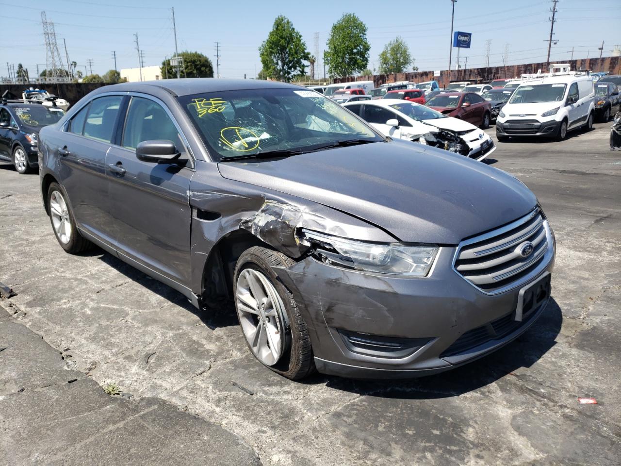 FORD TAURUS SEL 2014 with VIN 1FAHP2E83EG148107 - Photo from auction