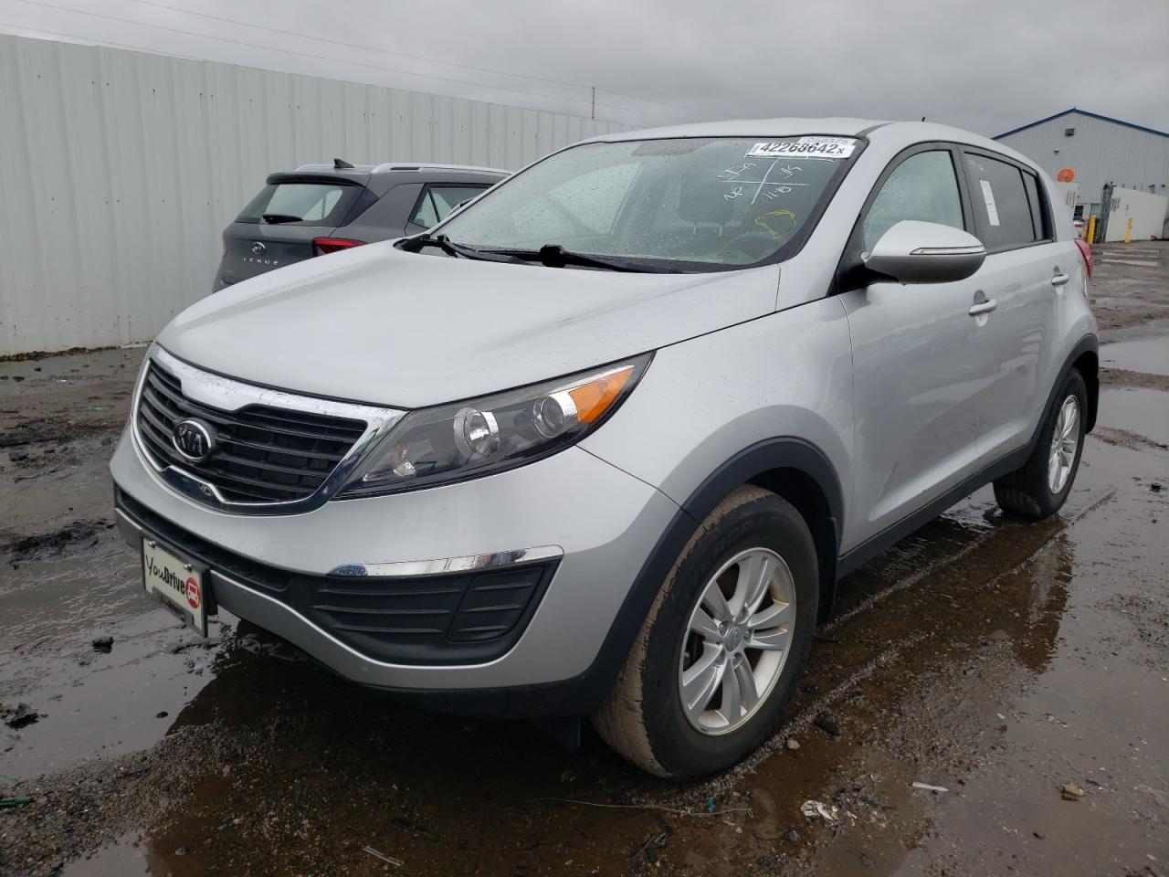 Photo 2 from auction – 2011 KIA SPORTAGE L with VIN KNDPBCA25B7100521