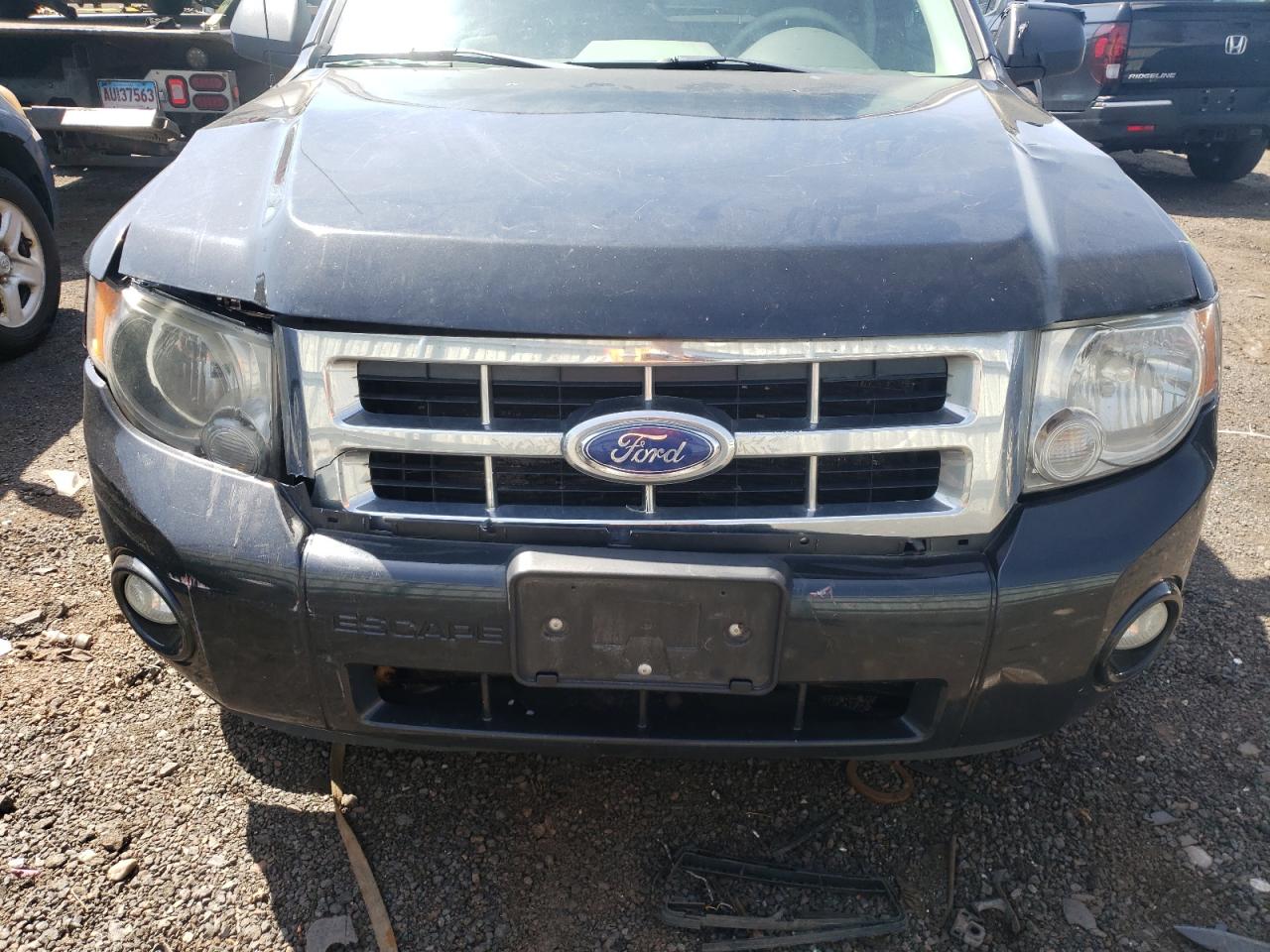 Photo 9 from auction – 2011 FORD ESCAPE XLT with VIN 1FMCU9D74BKC24274