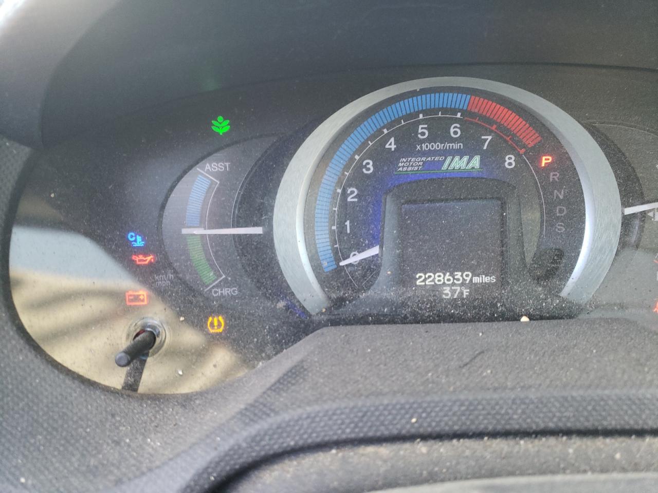 Photo 8 from auction – 2010 HONDA INSIGHT EX with VIN JHMZE2H79AS015932