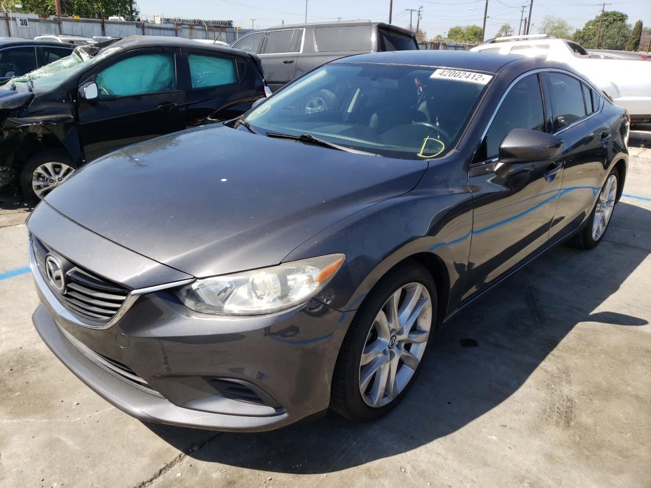 Photo 2 from auction – 2014 MAZDA 6 TOURING with VIN JM1GJ1V67E1135346