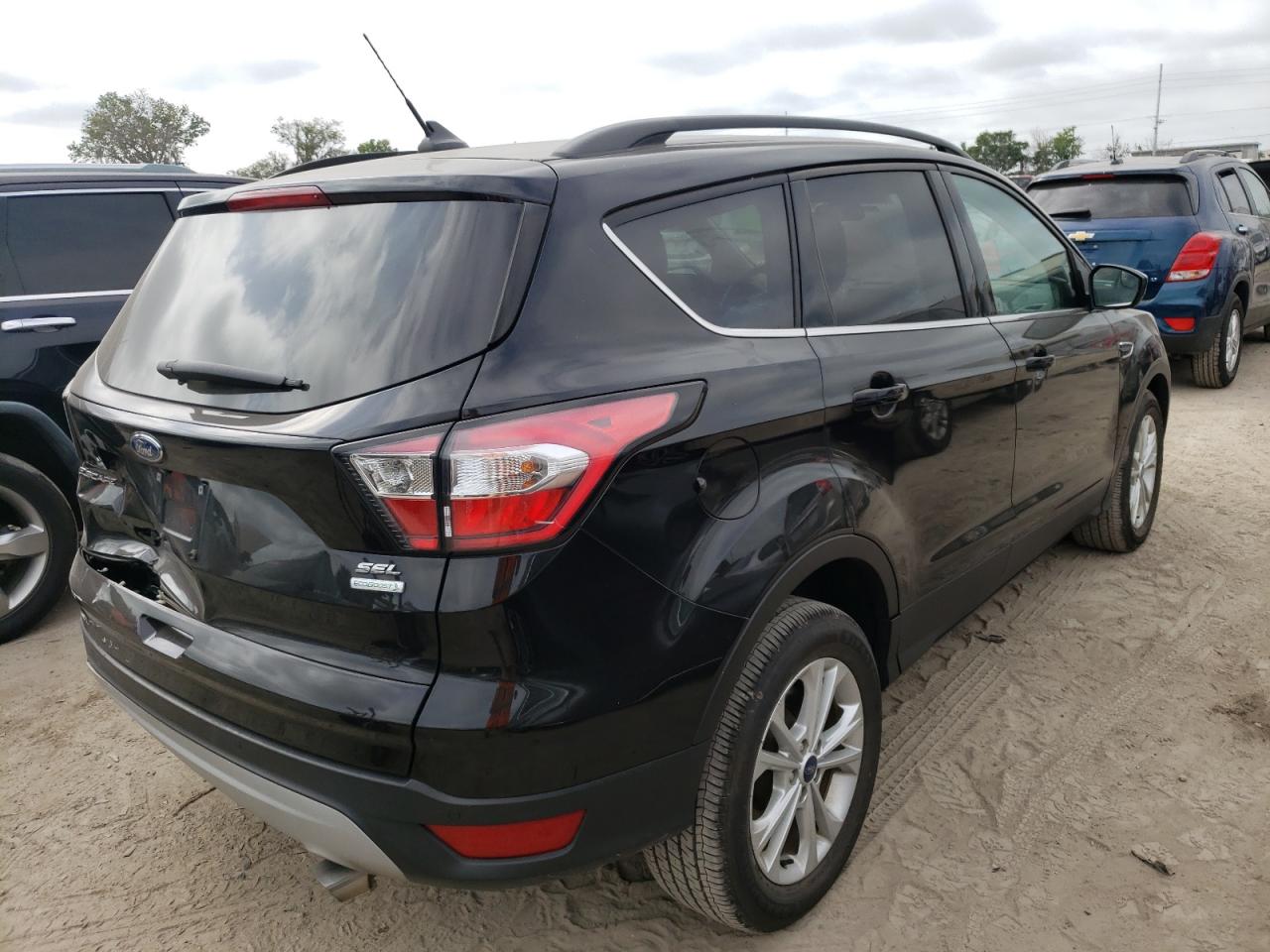 Photo 4 from auction – 2018 FORD ESCAPE SEL with VIN 1FMCU0HD7JUC79302