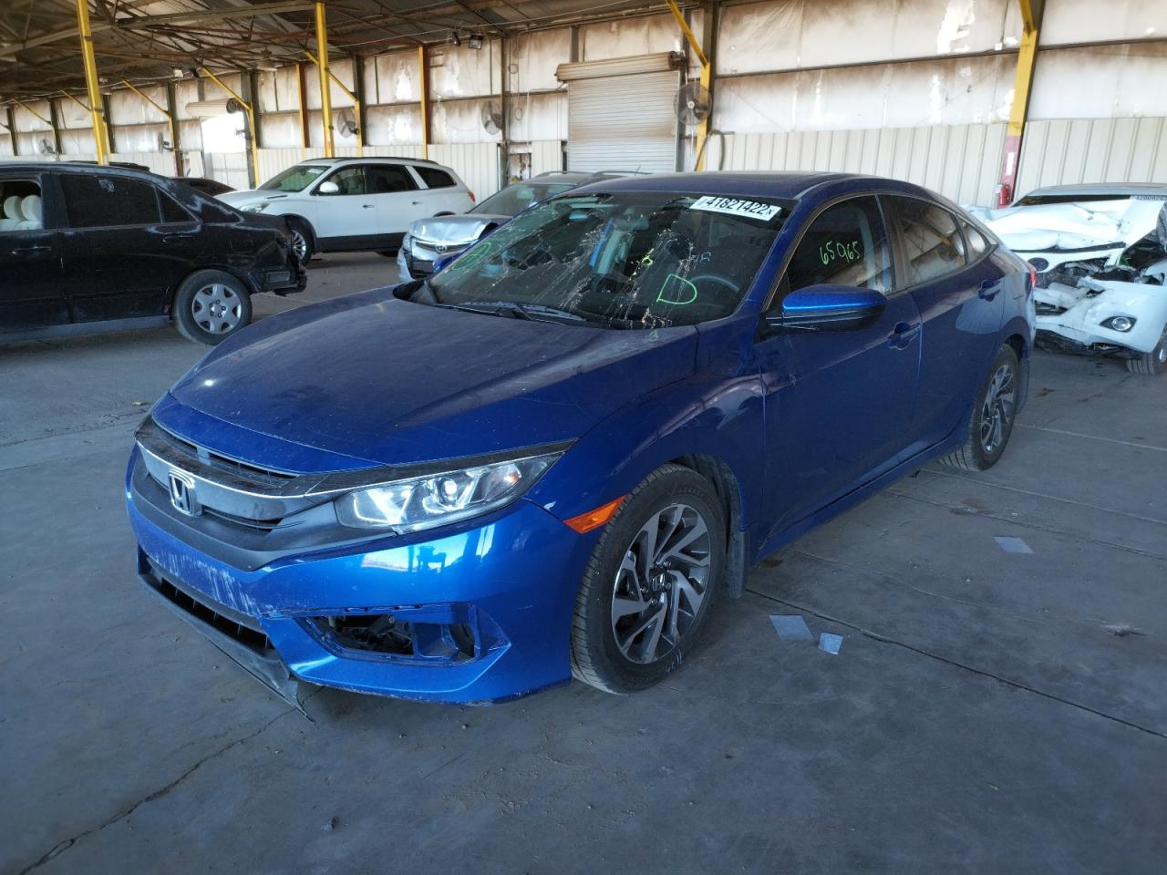 Photo 2 from auction – 2017 HONDA CIVIC EX with VIN 19XFC2F79HE018842