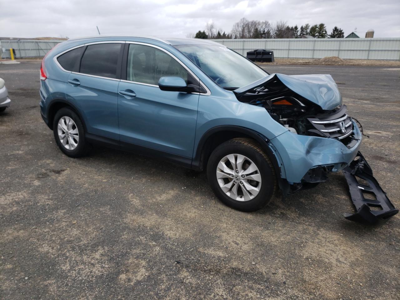 Photo 1 from auction – 2014 HONDA CR-V EXL with VIN 2HKRM4H73EH721735