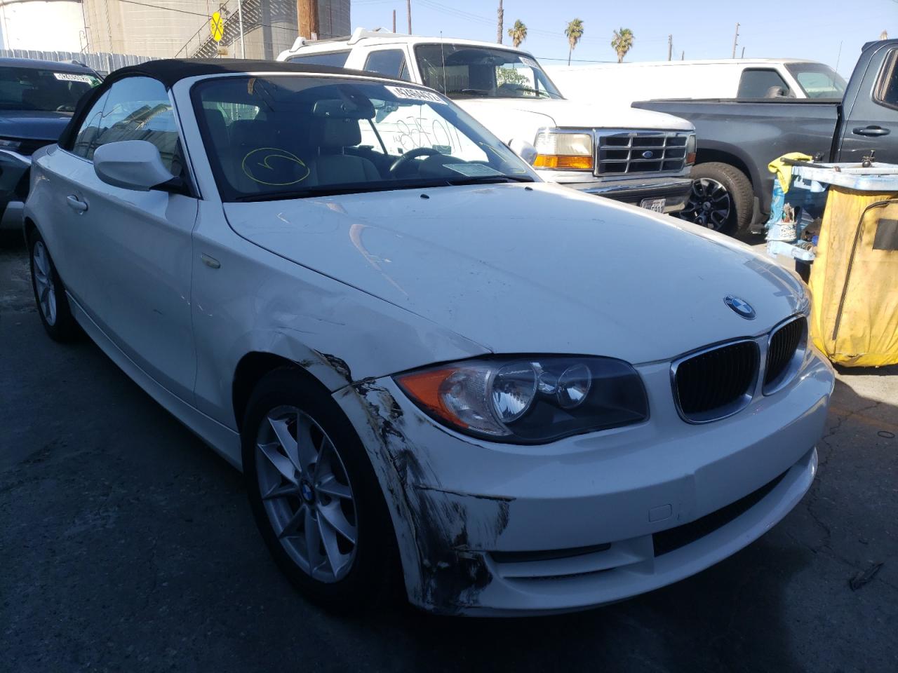BMW 128 I 2011 with VIN WBAUN1C5XBVH83852 - Photo from auction