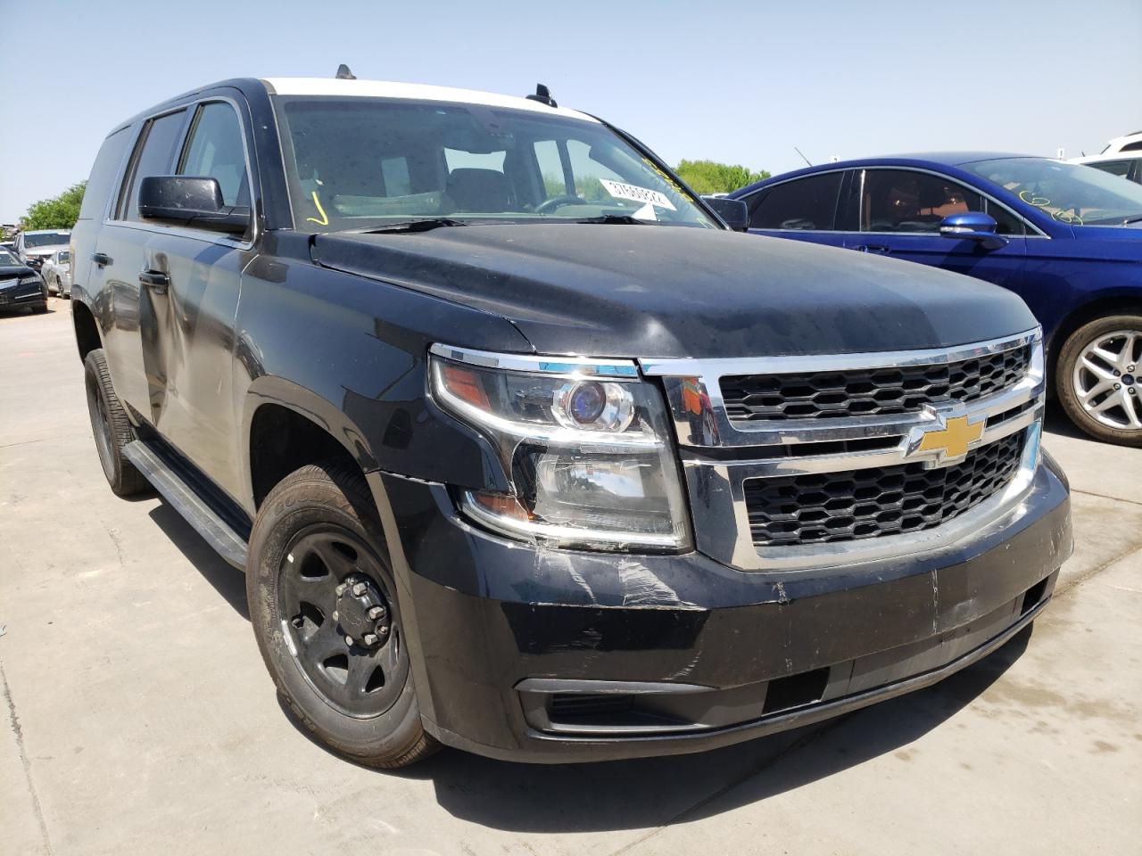 CHEVROLET TAHOE POLI 2015 with VIN 1GNLC2EC1FR639986 - Photo from auction