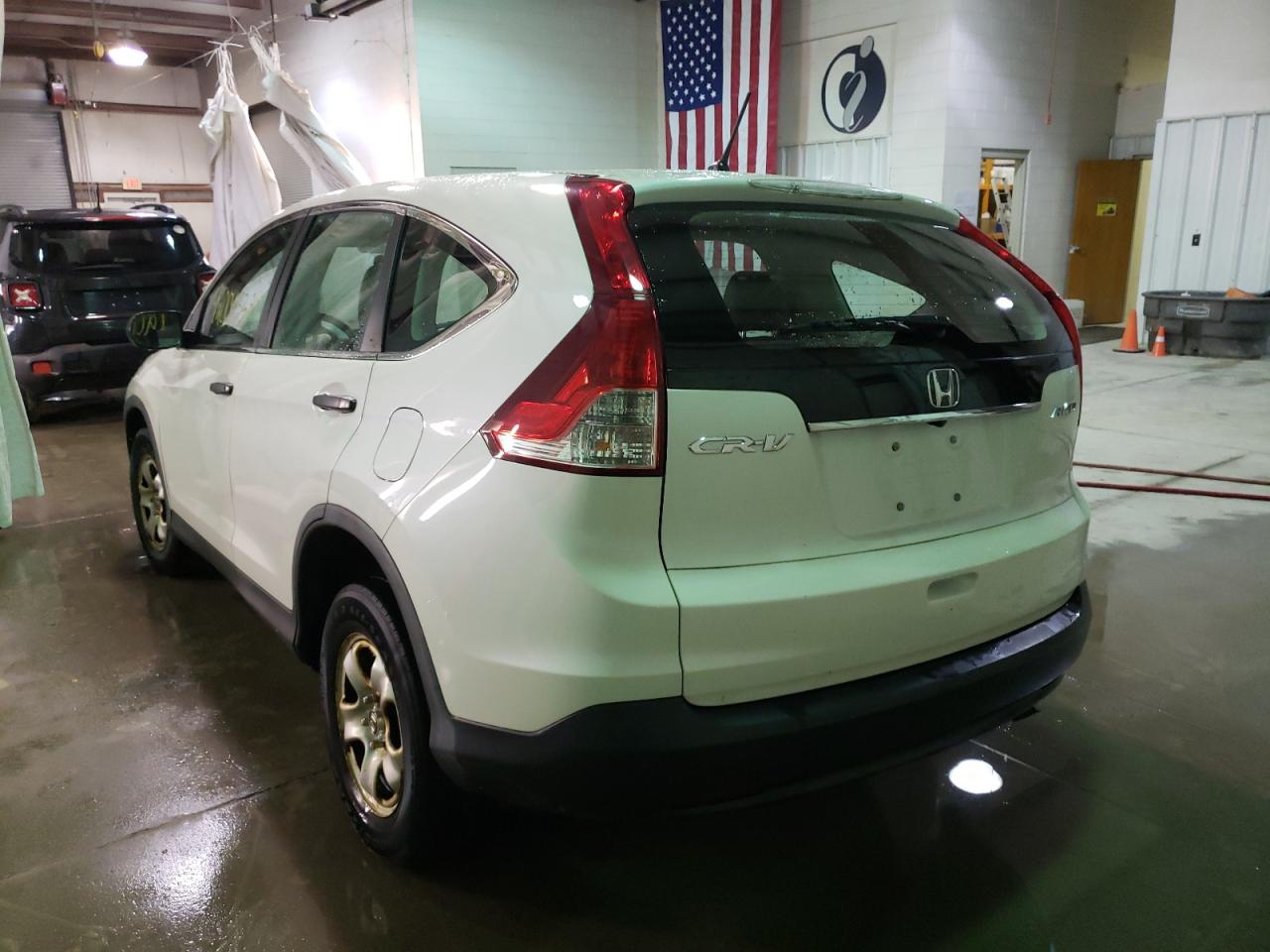 Photo 3 from auction – 2013 HONDA CR-V LX with VIN 5J6RM4H31DL079176