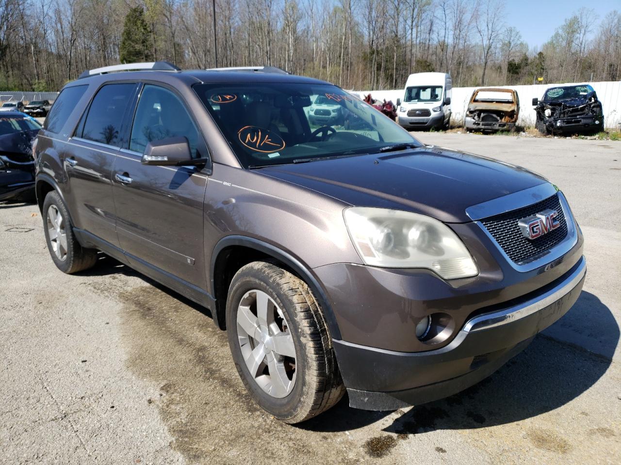 GMC ACADIA SLT 2010 with VIN 1GKLRMED8AJ170094 - Photo from auction