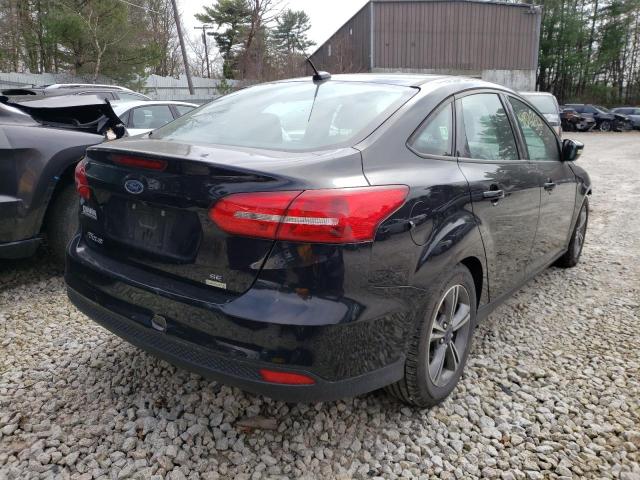 Photo 4 from auction – 2016 FORD FOCUS SE with VIN 1FADP3FE0GL260818