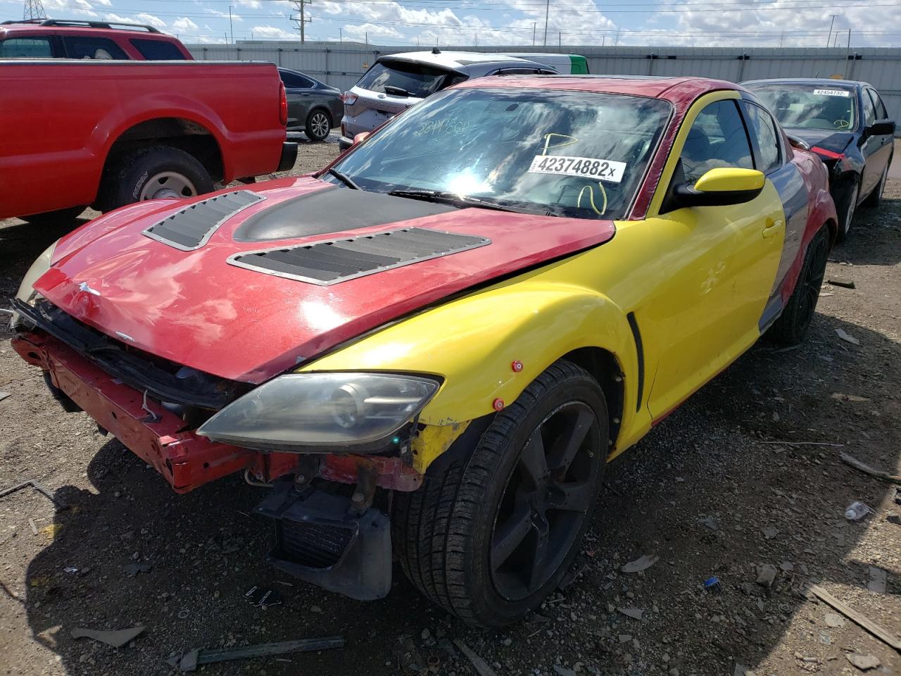 Photo 2 from auction – 2004 MAZDA RX8 with VIN JM1FE173340115912