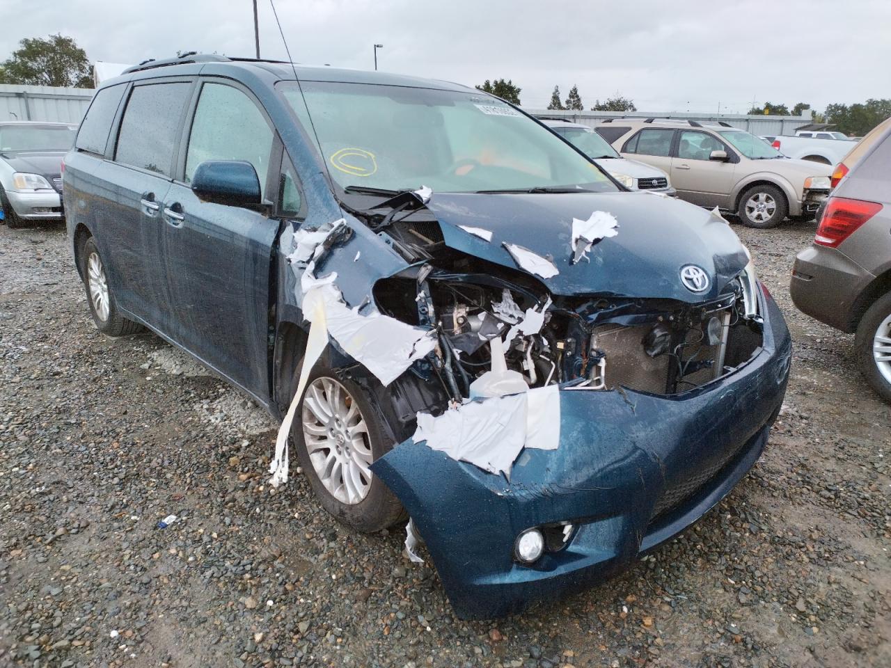 TOYOTA SIENNA XLE 2012 with VIN 5TDYK3DC1CS274621 - Photo from auction