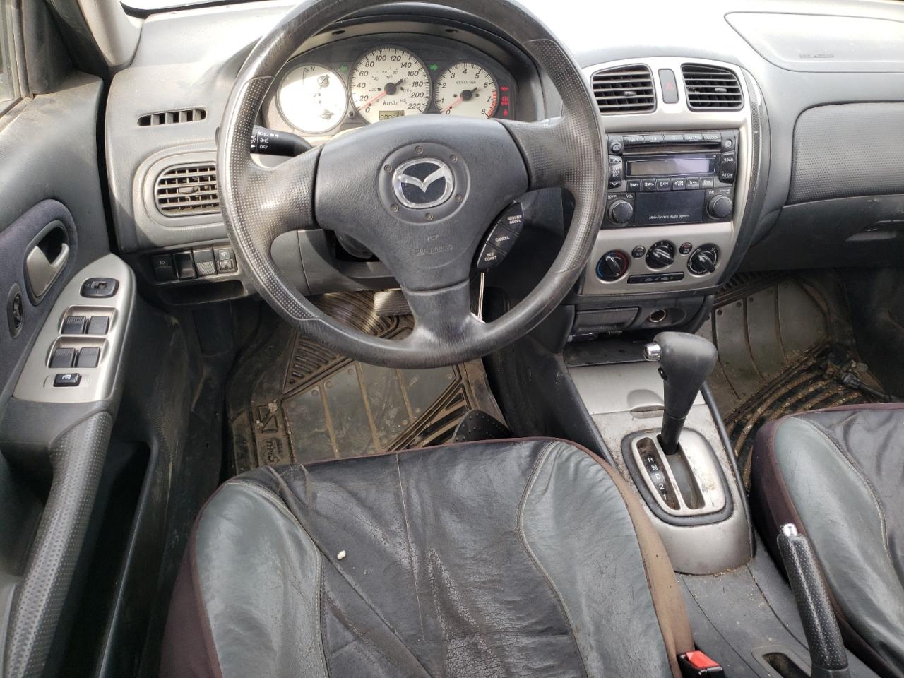 Photo 9 from auction – 2002 MAZDA PROTEGE PR with VIN JM1BJ245321595317