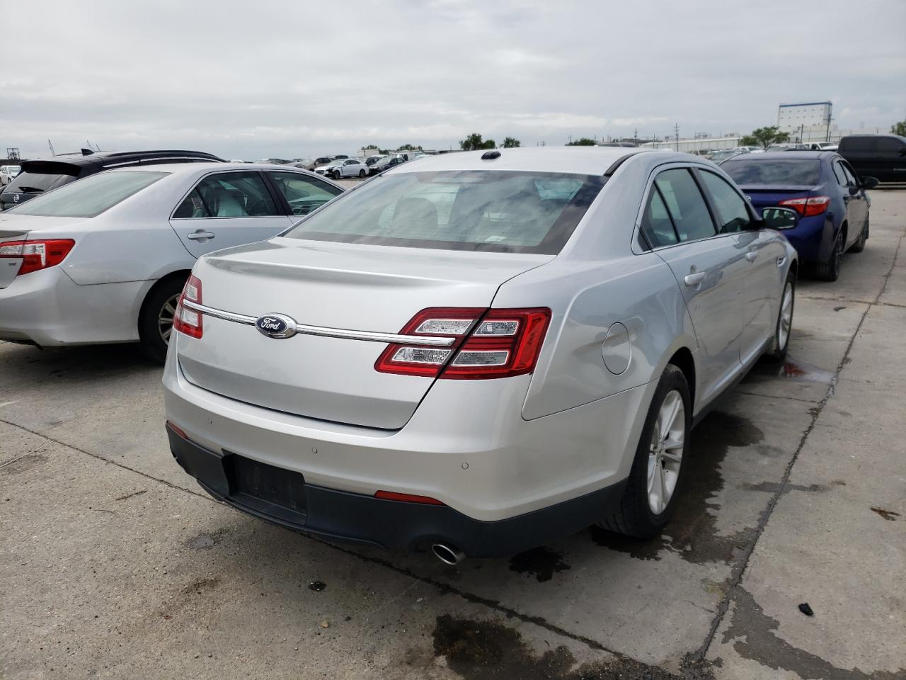 Photo 4 from auction – 2016 FORD TAURUS SEL with VIN 1FAHP2E83GG111688