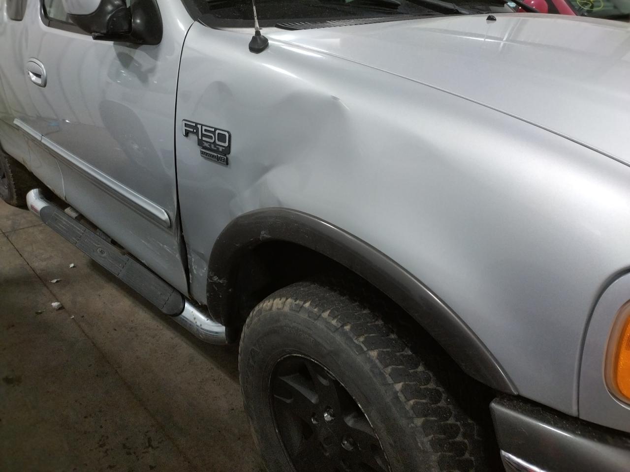 Photo 9 from auction – 2002 FORD F150 with VIN 1FTRX18L42NA93280