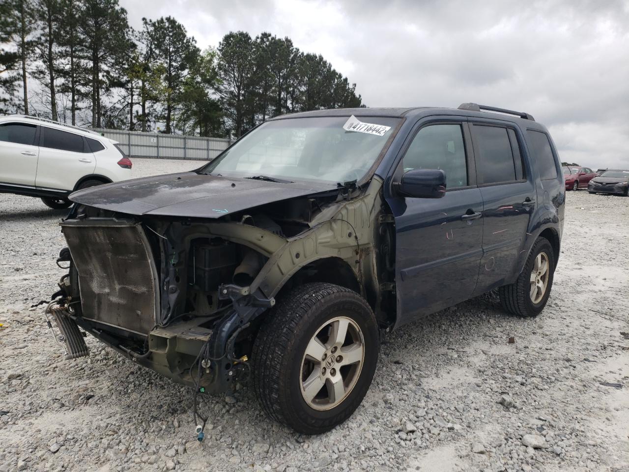 Photo 2 from auction – 2011 HONDA PILOT EXLN with VIN 5FNYF3H75BB002271