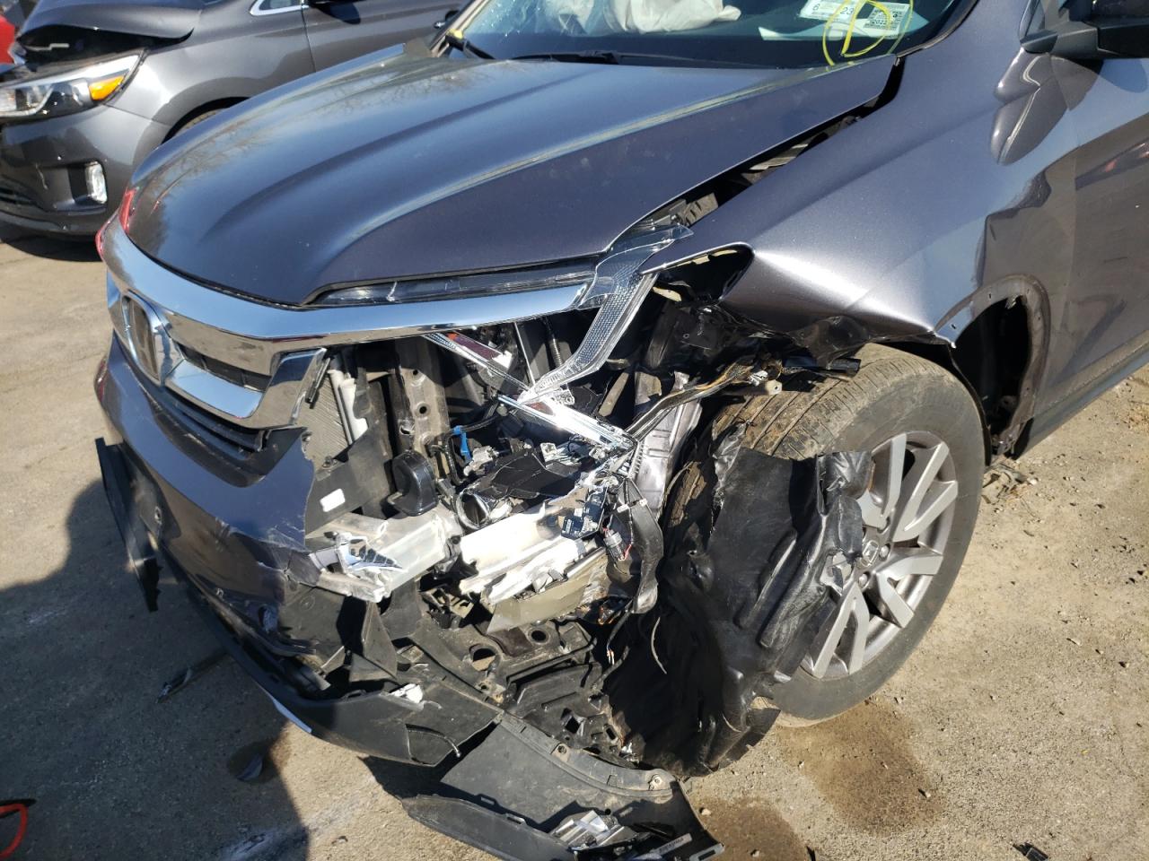 Photo 9 from auction – 2020 HONDA PILOT EXL with VIN 5FNYF6H51LB053851