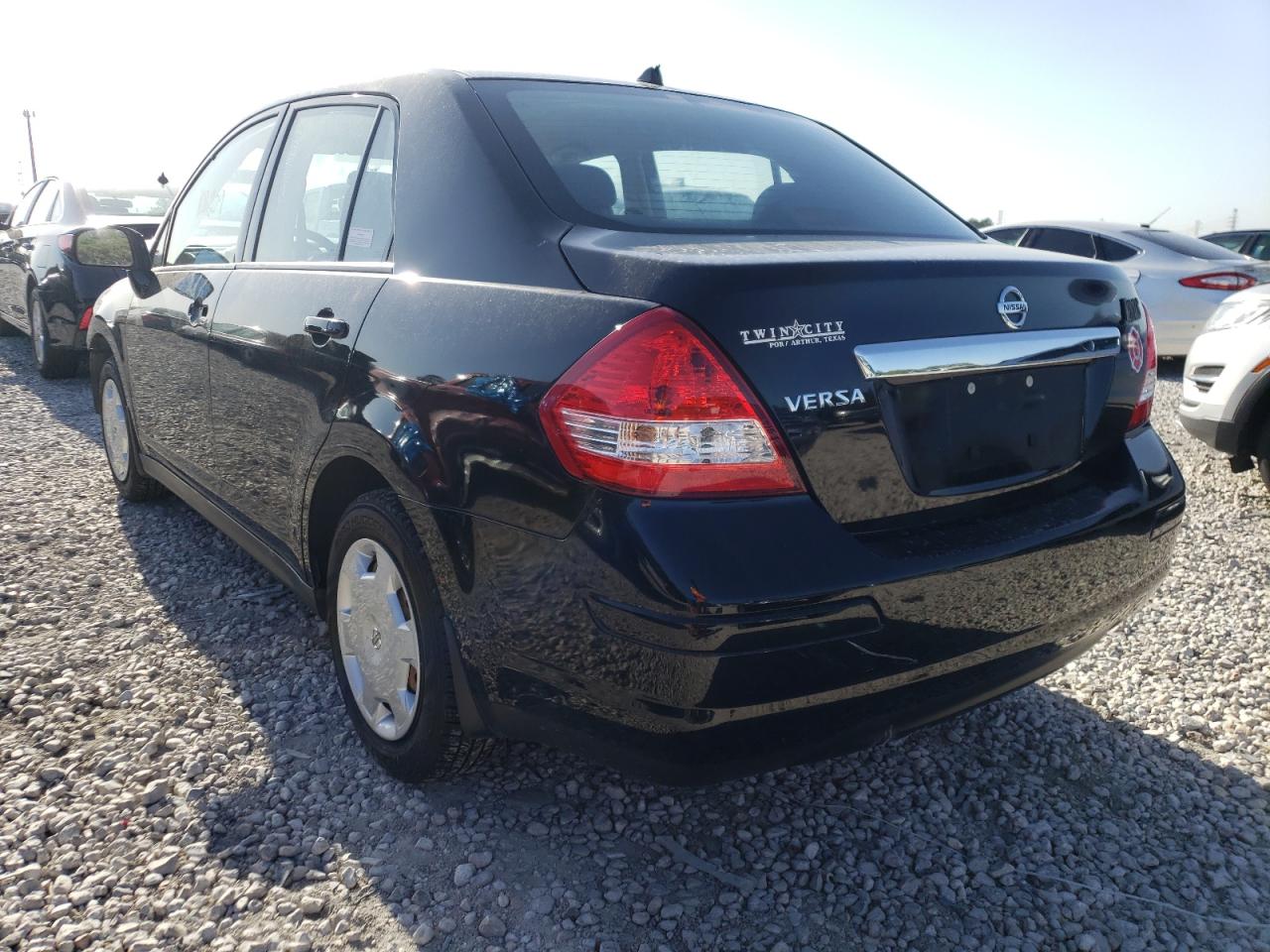 Photo 3 from auction – 2009 NISSAN VERSA S with VIN 3N1BC11E49L460104