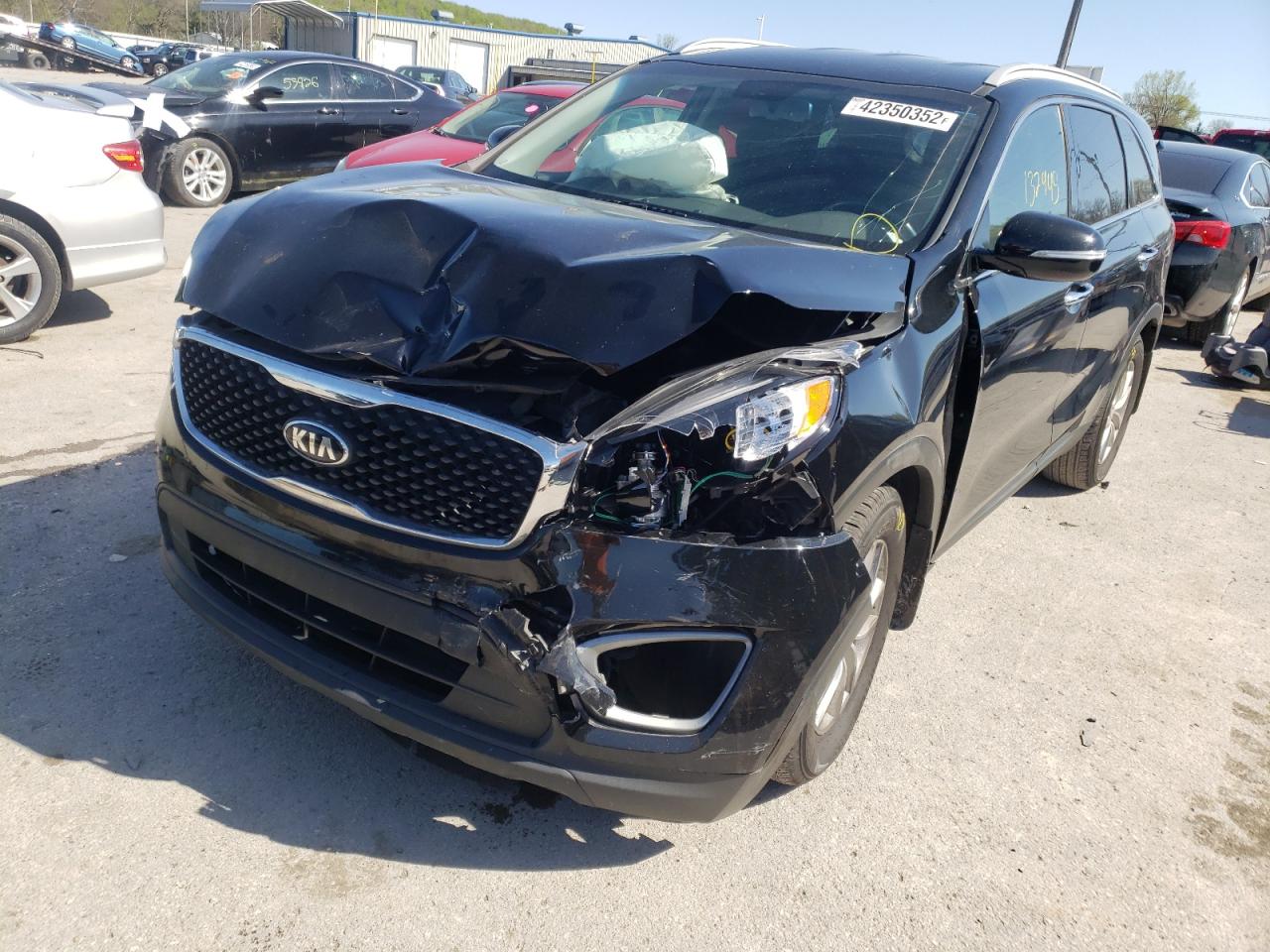 Photo 2 from auction – 2016 KIA SORENTO LX with VIN 5XYPG4A38GG063524