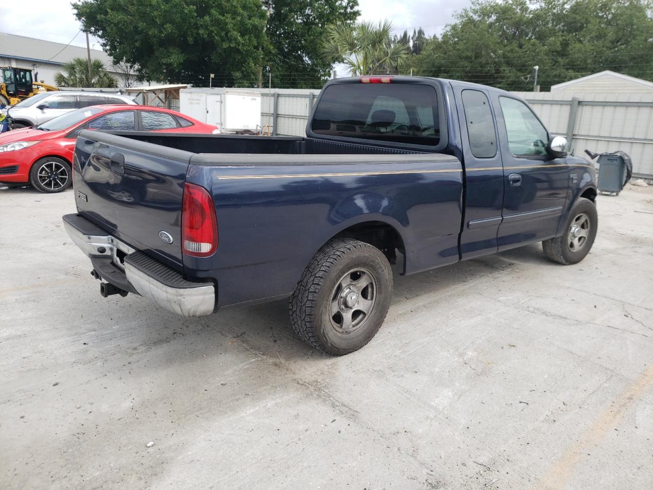 Photo 4 from auction – 2002 FORD F150 with VIN 1FTRX17W42NA69900