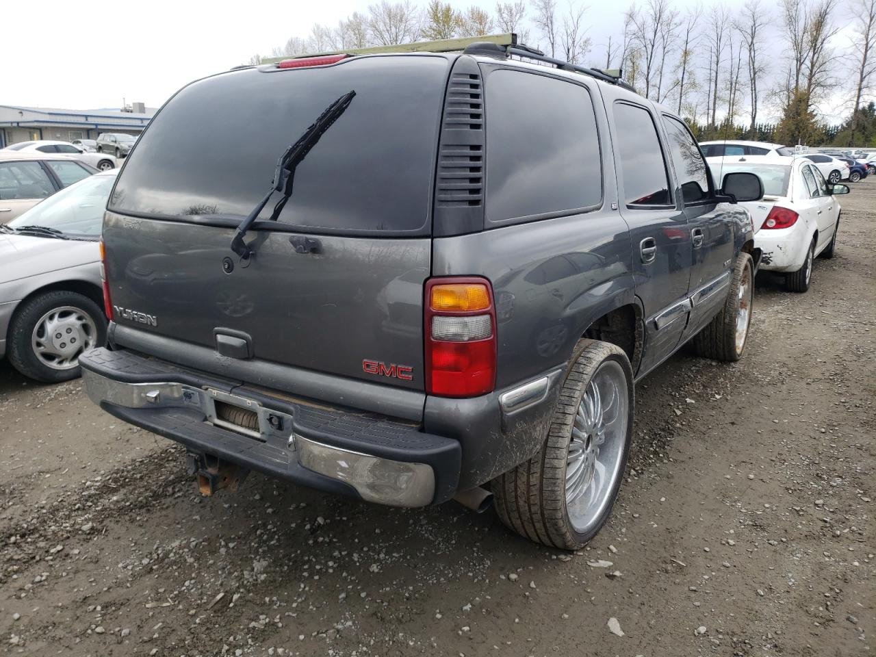 Photo 4 from auction – 2001 GMC YUKON with VIN 1GKEK13T11J142319