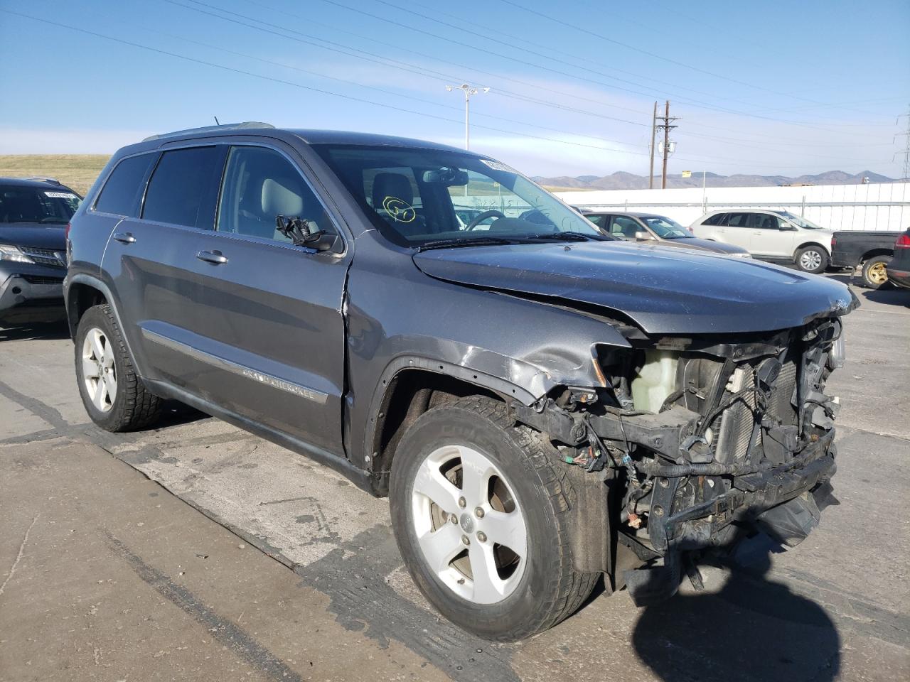 JEEP GRAND CHER 2011 with VIN 1J4RR4GT8BC705645 - Photo from auction