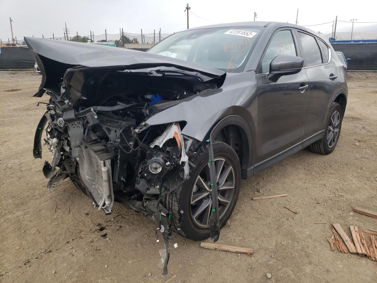 Photo 2 from auction – 2018 MAZDA CX-5 TOURI with VIN JM3KFACM1J0363041