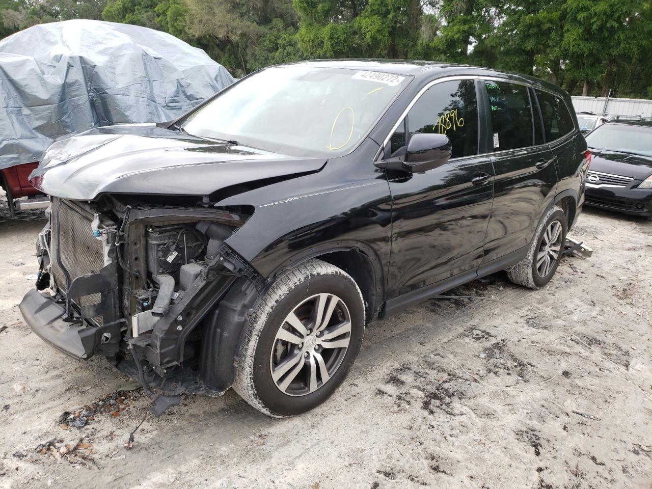 Photo 2 from auction – 2017 HONDA PILOT EXL with VIN 5FNYF5H59HB005757