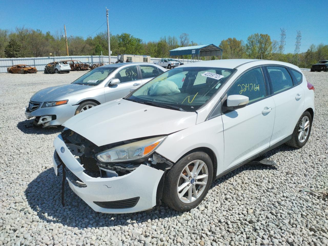 Photo 2 from auction – 2015 FORD FOCUS SE with VIN 1FADP3K2XFL273358