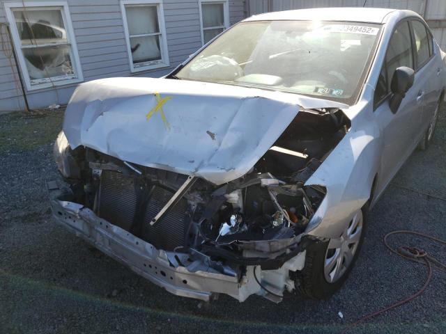 Photo 9 from auction – 2014 SUBARU IMPREZA with VIN JF1GJAA60EG026400