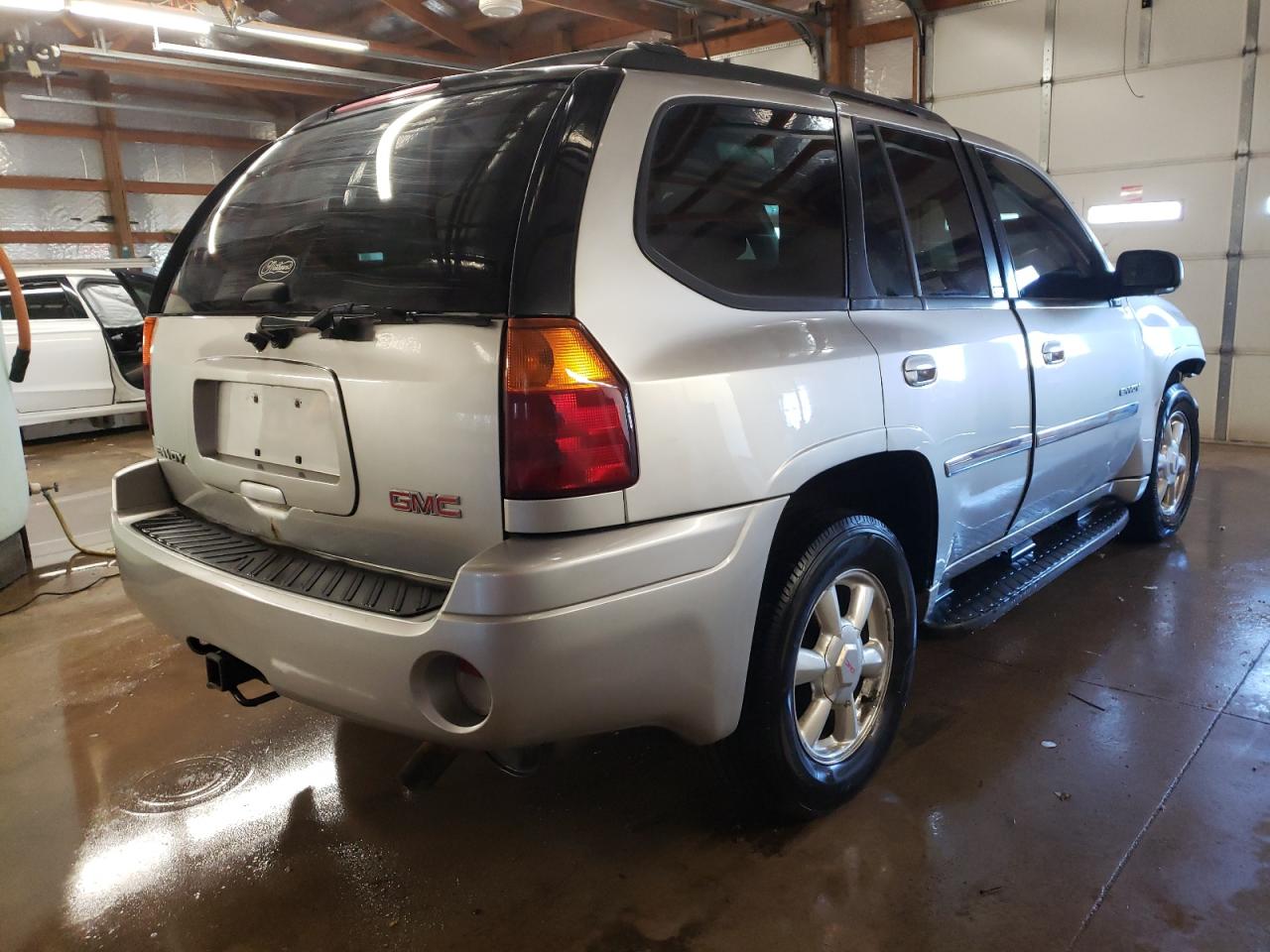Photo 4 from auction – 2006 GMC ENVOY with VIN 1GKDT13S462154613