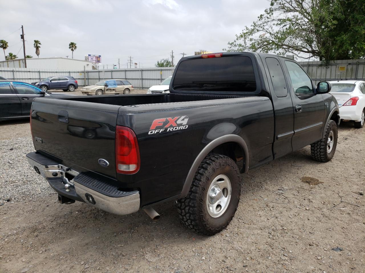 Photo 4 from auction – 2002 FORD F150 with VIN 1FTRX18W72KC80802
