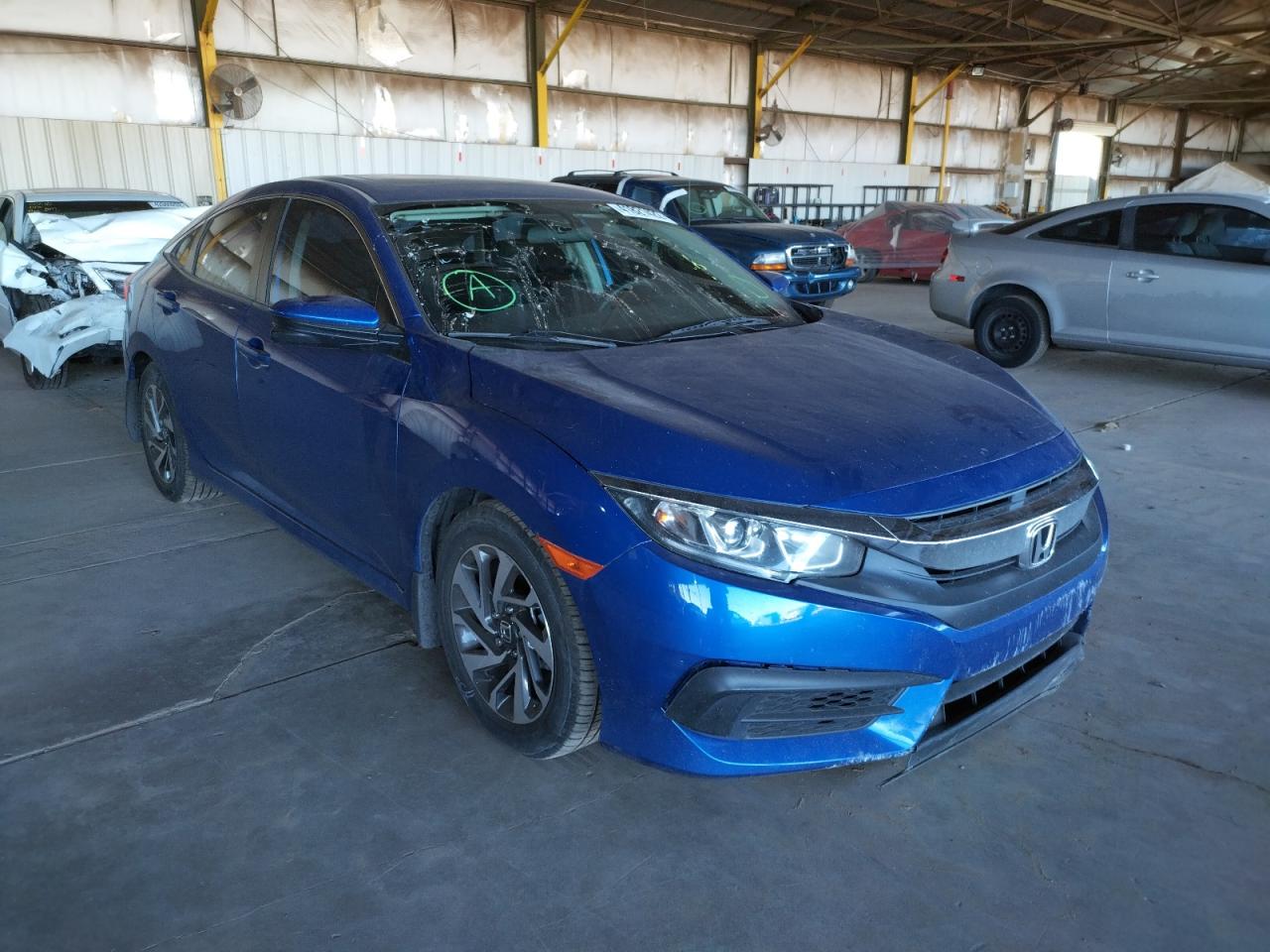 HONDA CIVIC EX 2017 with VIN 19XFC2F79HE018842 - Photo from auction