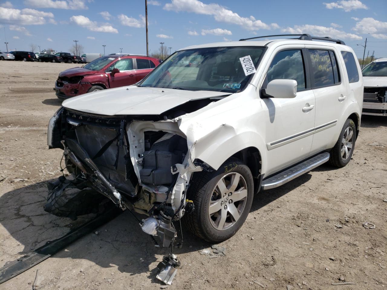 Photo 2 from auction – 2013 HONDA PILOT TOUR with VIN 5FNYF4H98DB076083