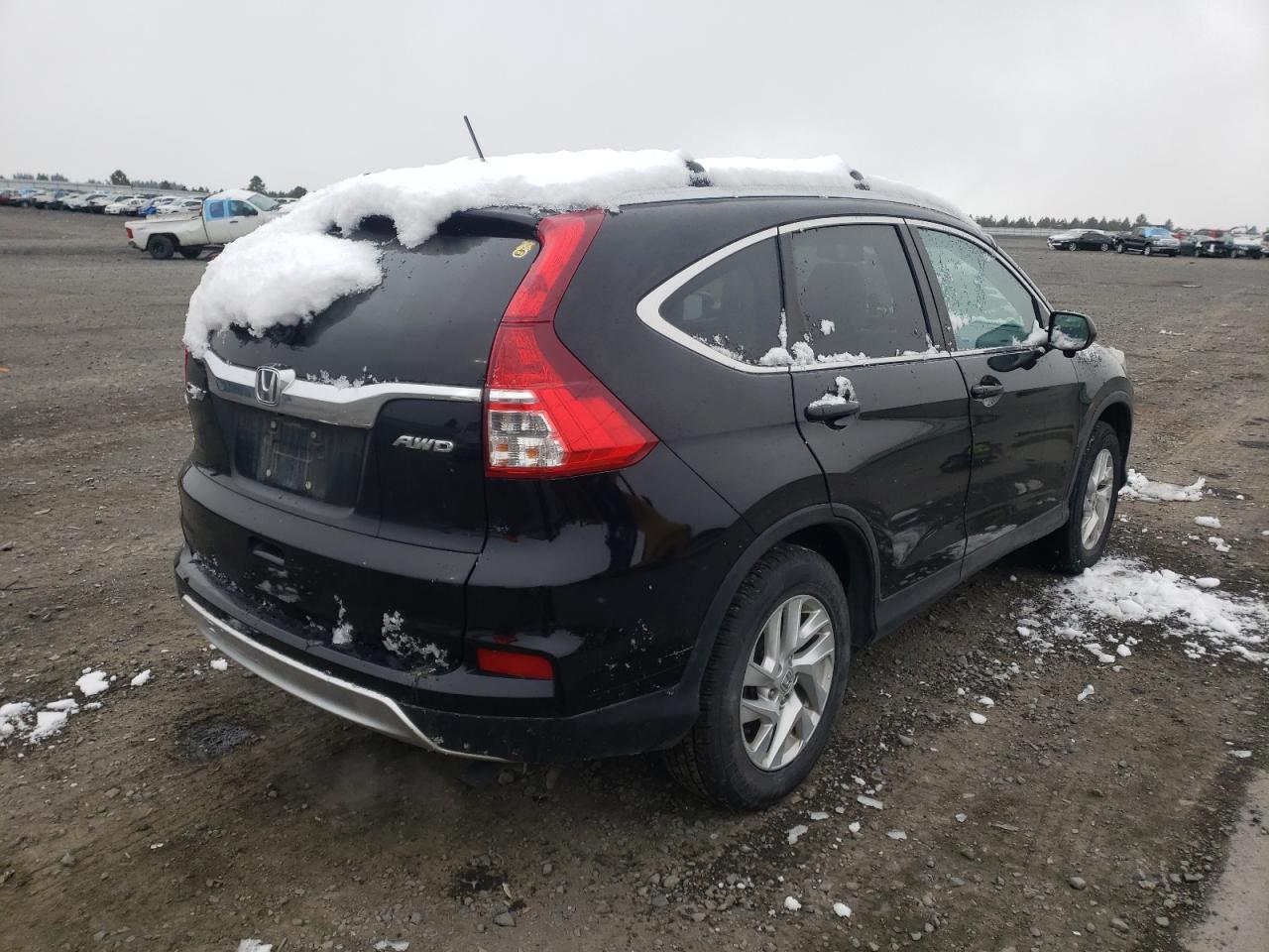 Photo 4 from auction – 2016 HONDA CR-V EXL with VIN 5J6RM4H75GL074294