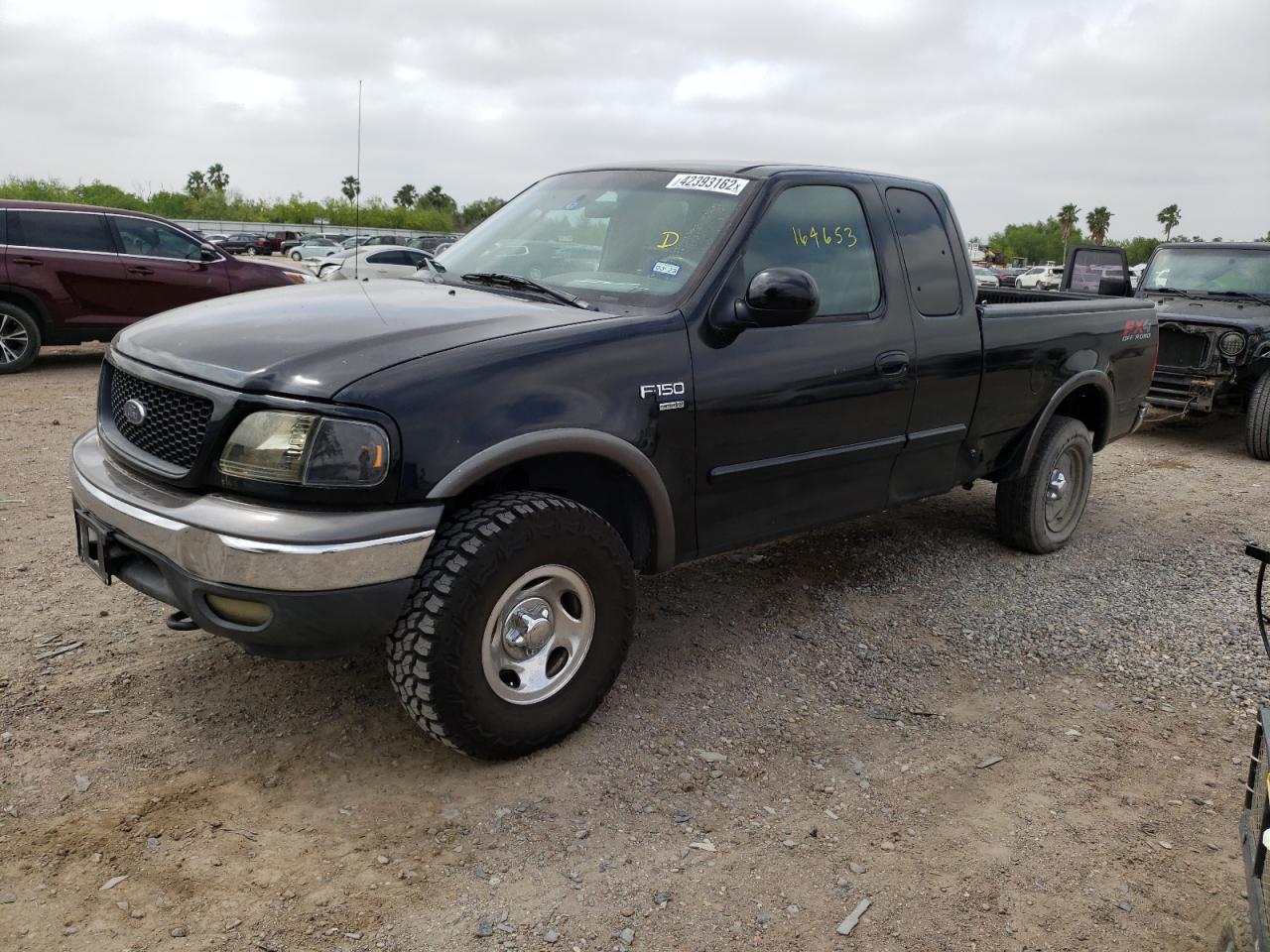 Photo 2 from auction – 2002 FORD F150 with VIN 1FTRX18W72KC80802