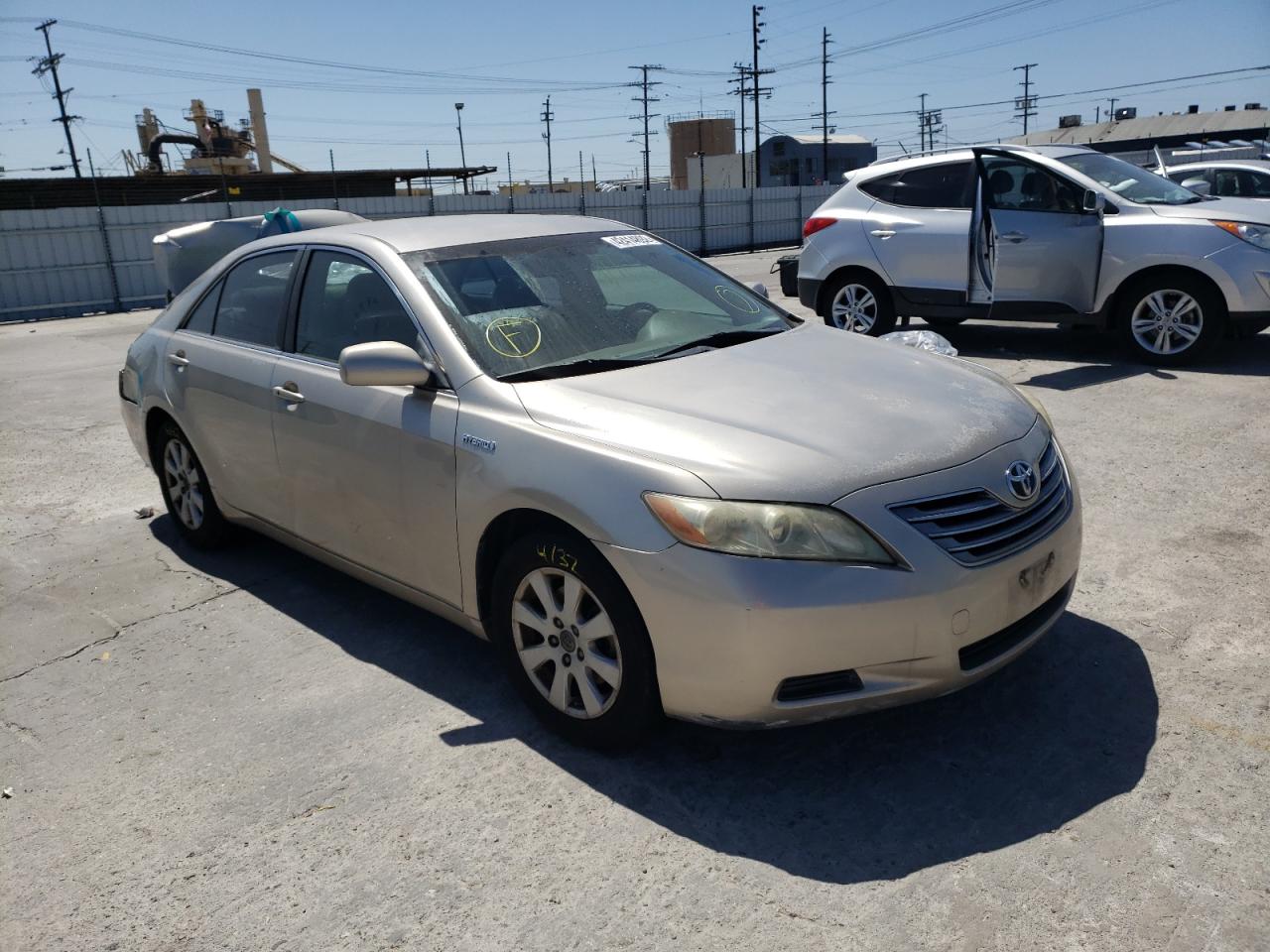 Photo 1 from auction – 2007 TOYOTA CAMRY HYBR with VIN JTNBB46K573003208