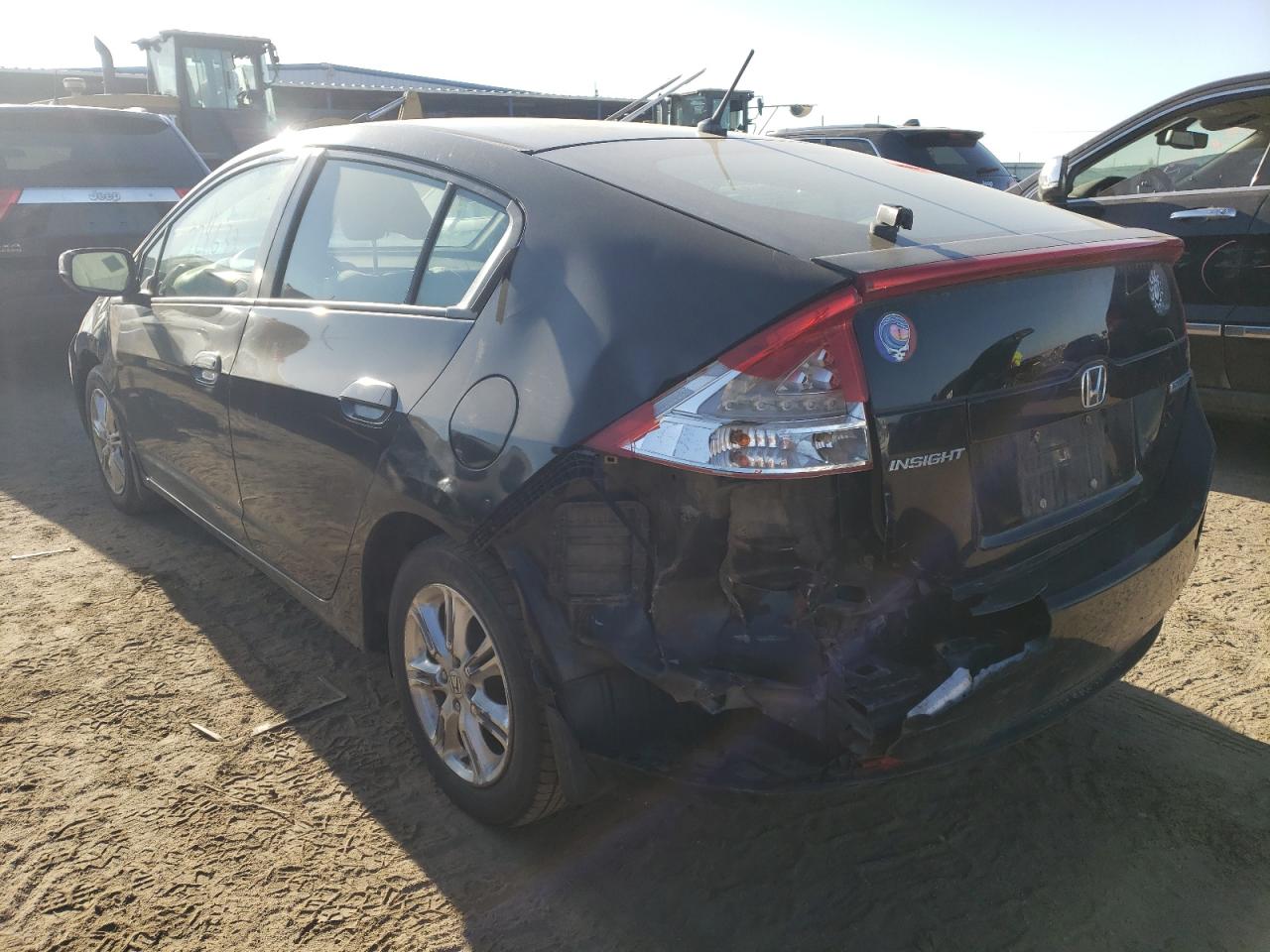 Photo 3 from auction – 2010 HONDA INSIGHT EX with VIN JHMZE2H79AS015932