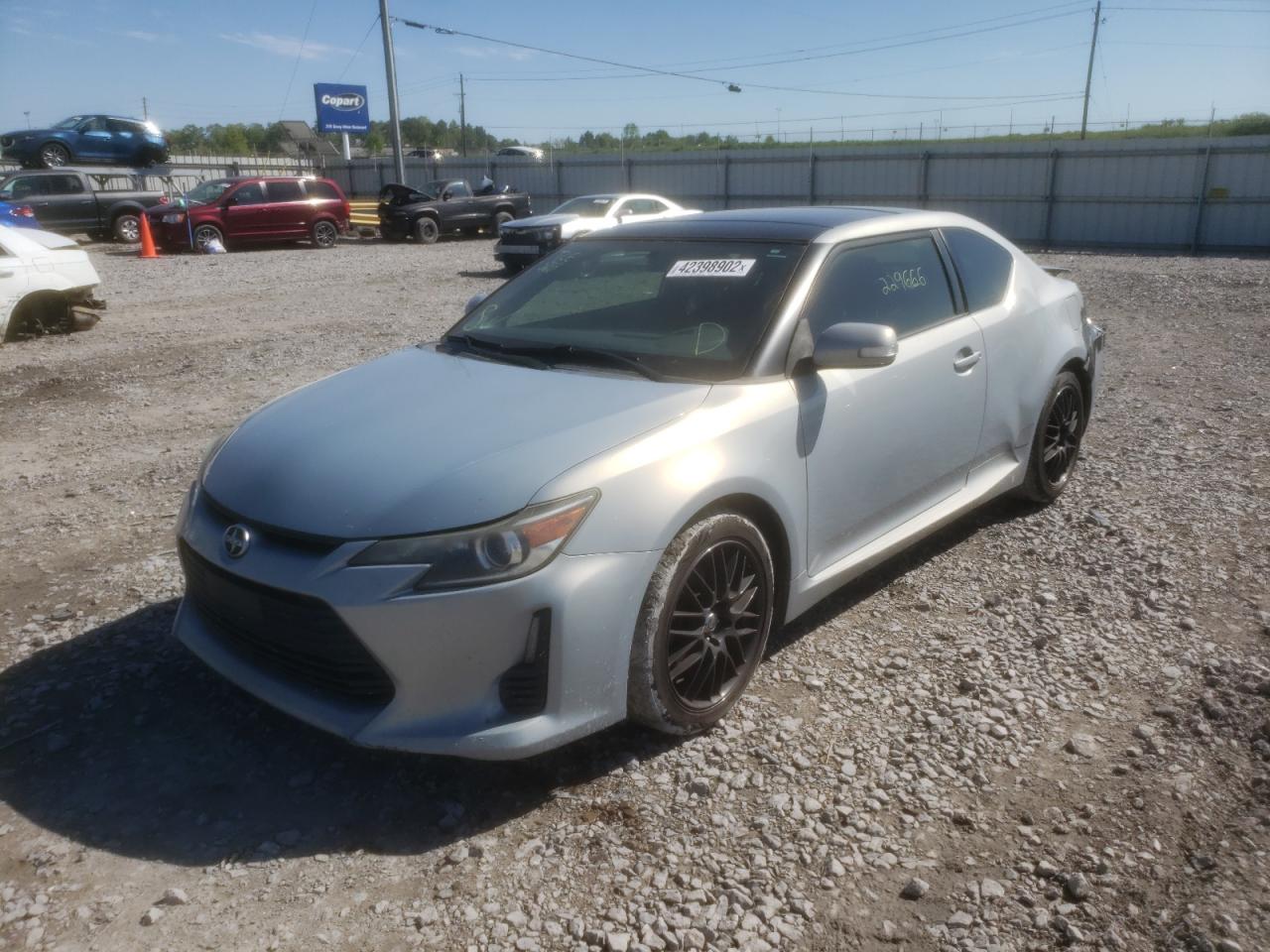 Photo 2 from auction – 2014 TOYOTA SCION TC with VIN JTKJF5C72E3068565