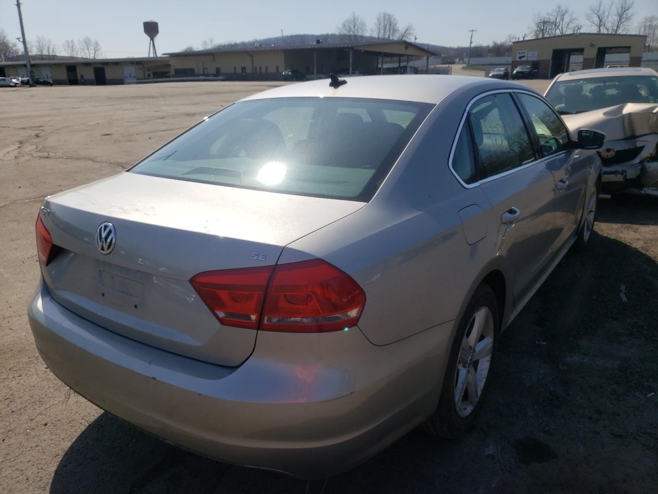 Photo 4 from auction – 2014 VOLKSWAGEN PASSAT SE with VIN 1VWBP7A37EC006211