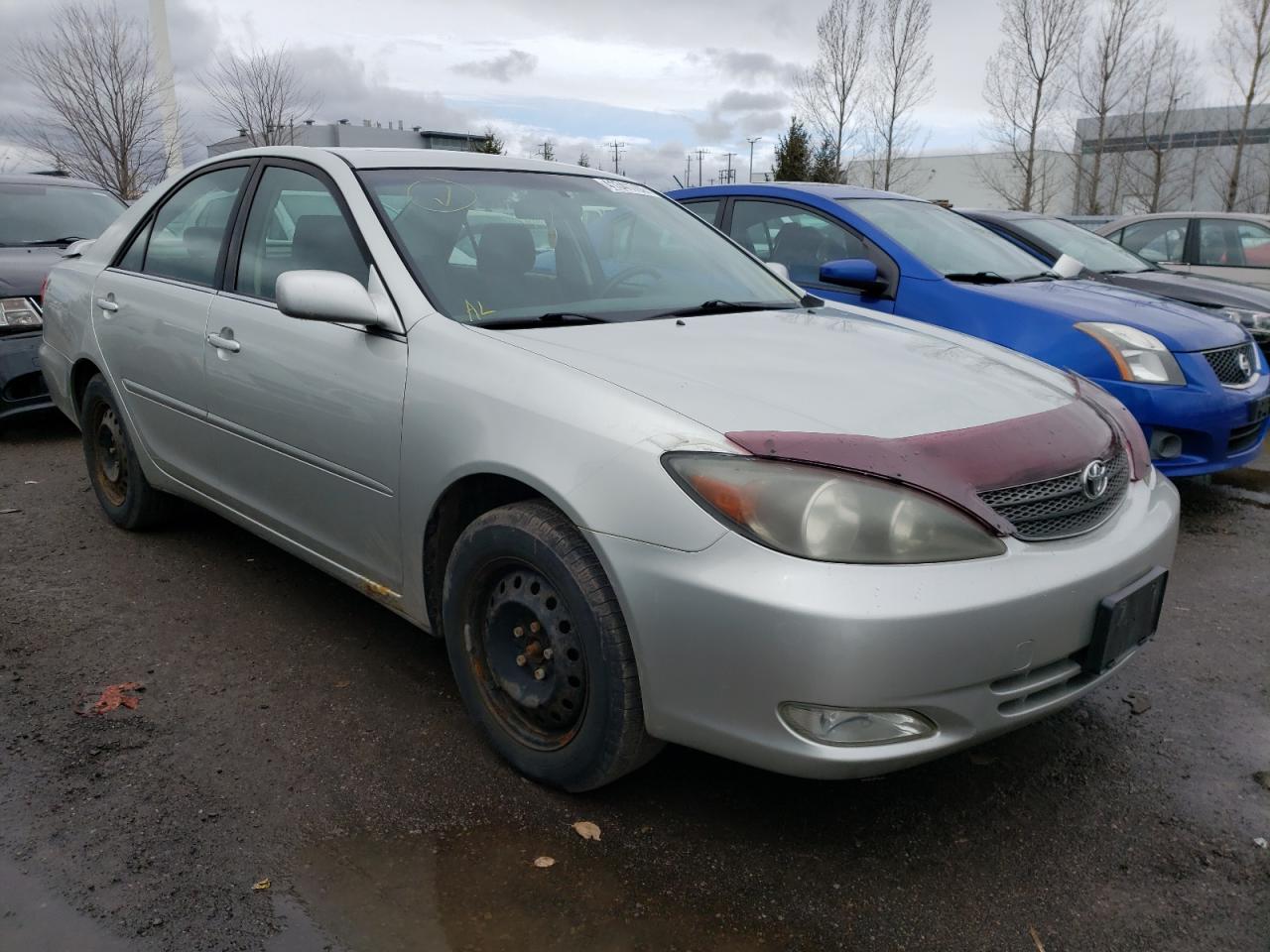 TOYOTA CAMRY LE 2002 with VIN JTDBF32K020021005 - Photo from auction