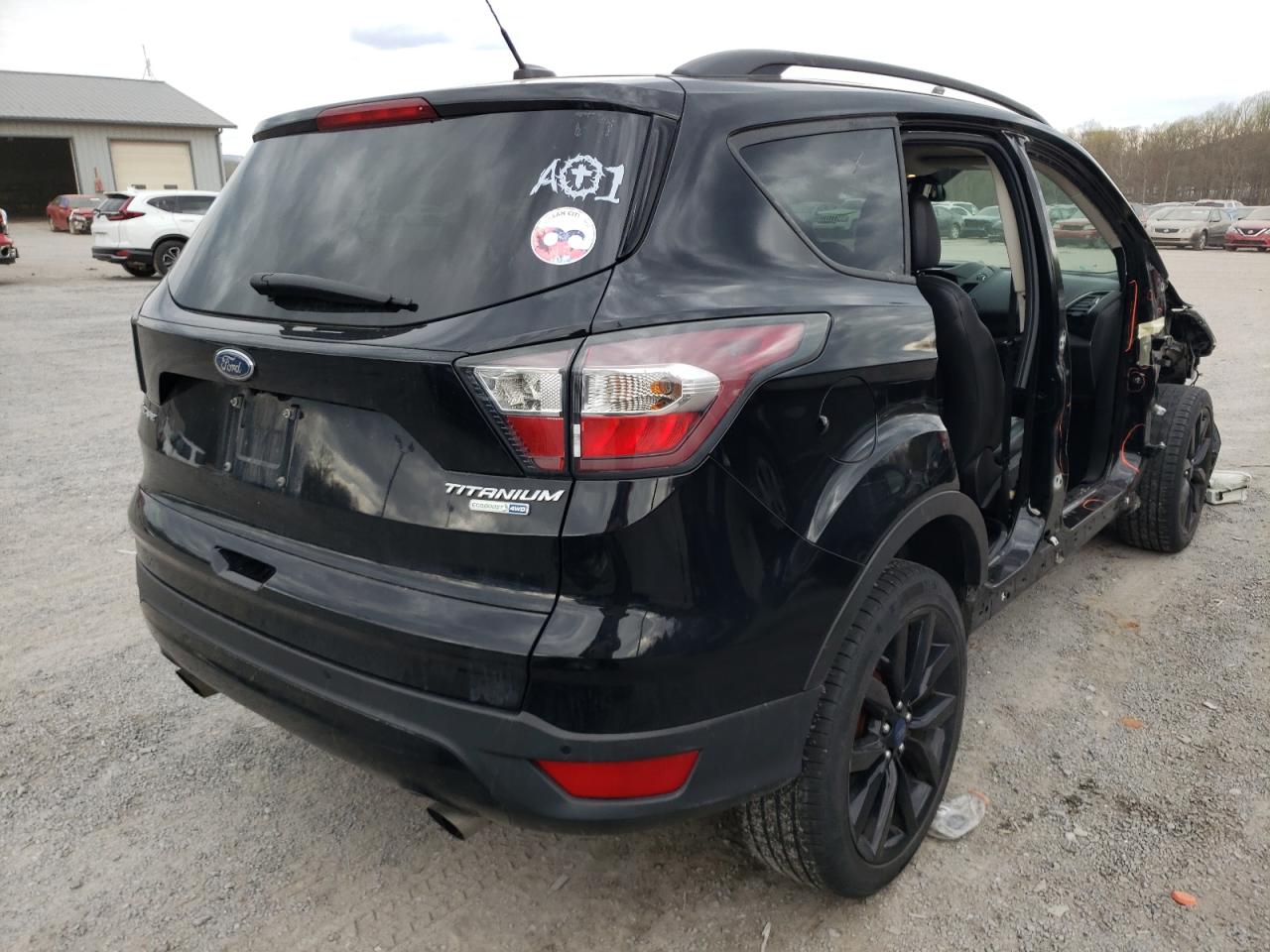 Photo 4 from auction – 2017 FORD ESCAPE TIT with VIN 1FMCU9J91HUA08093