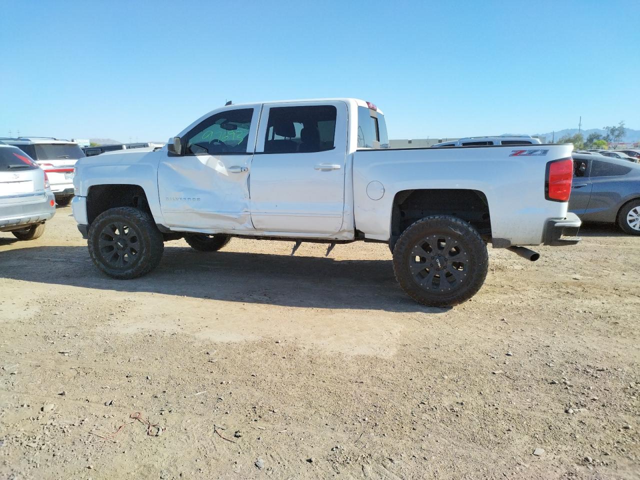 Photo 9 from auction – 2017 CHEVROLET SILVERADO with VIN 3GCUKREC1HG199747