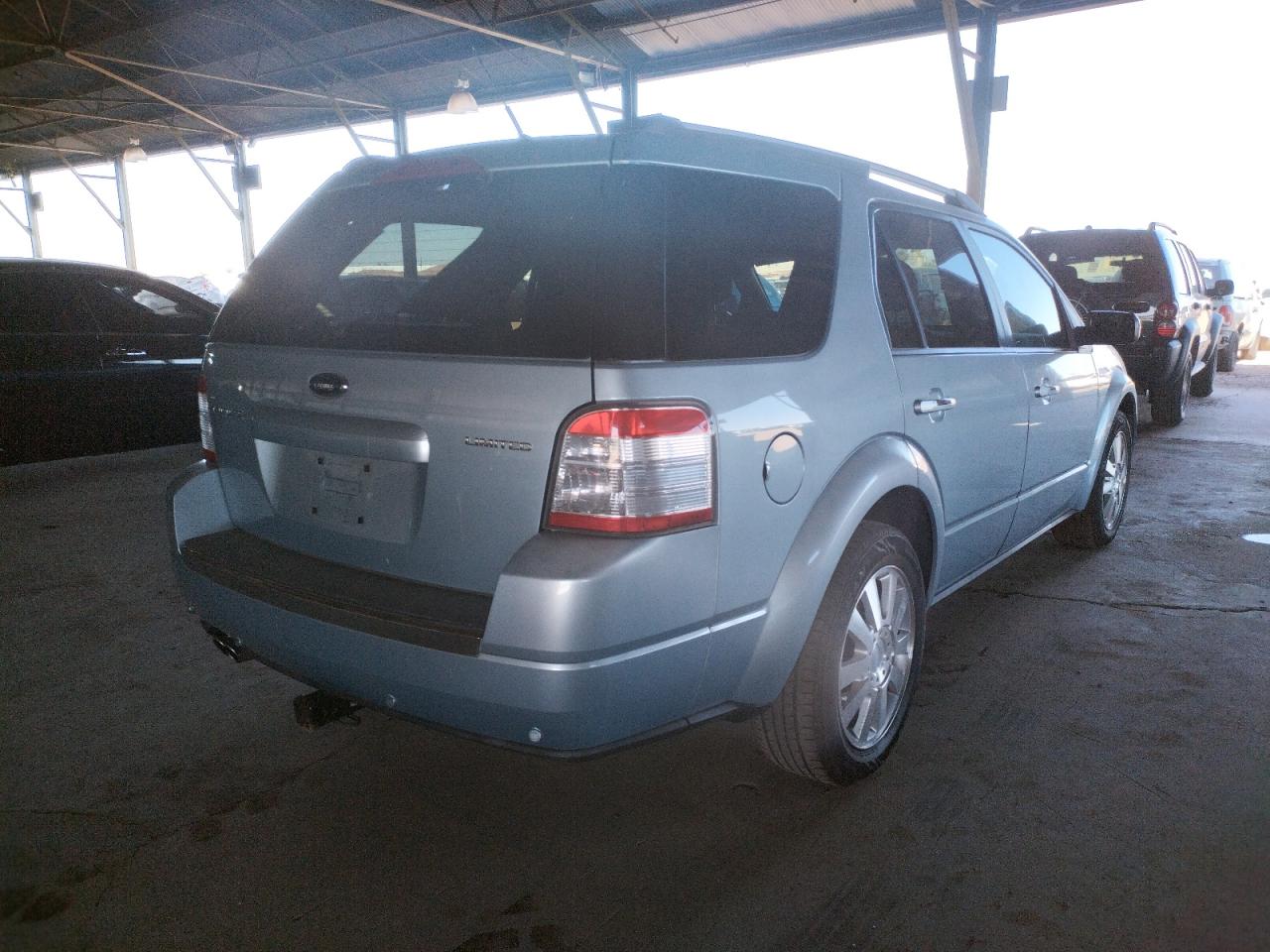 Photo 4 from auction – 2008 FORD TAURUS X L with VIN 1FMDK03W28GA18185