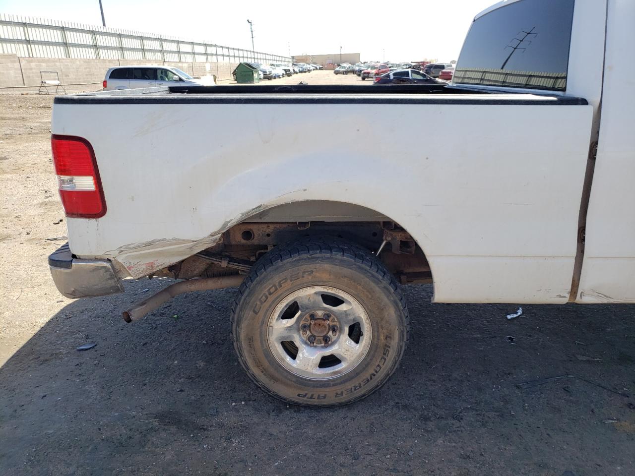 Photo 9 from auction – 2005 FORD F150 with VIN 1FTPX145X5KD96715