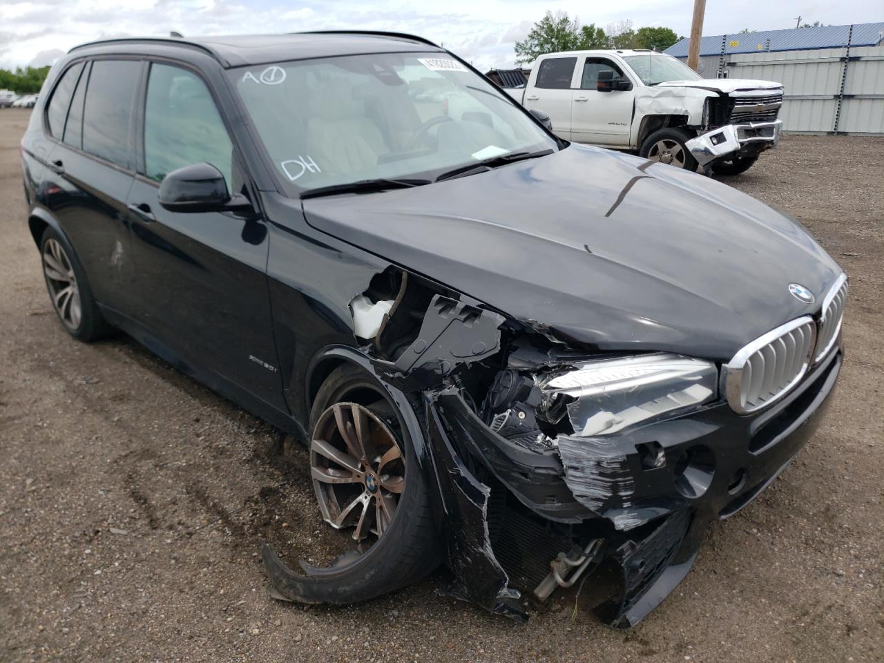 BMW X5 XDRIVE5 2014 with VIN 5UXKR6C52E0C02145 - Photo from auction