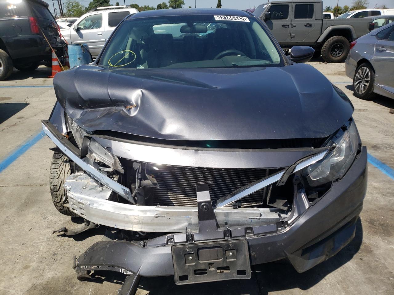 Photo 9 from auction – 2018 HONDA CIVIC LX with VIN 2HGFC2F52JH576204