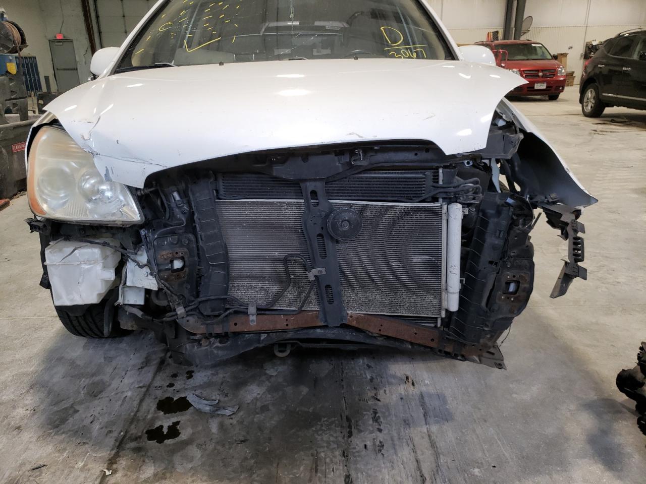 Photo 9 from auction – 2009 KIA RONDO BASE with VIN KNAFG528397273067