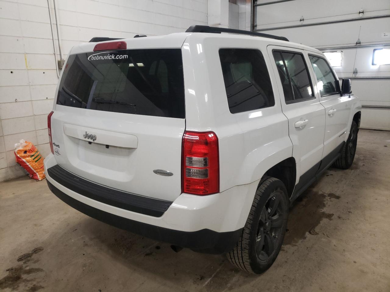 Photo 4 from auction – 2012 JEEP PATRIOT LA with VIN 1C4NJRFB2CD633418