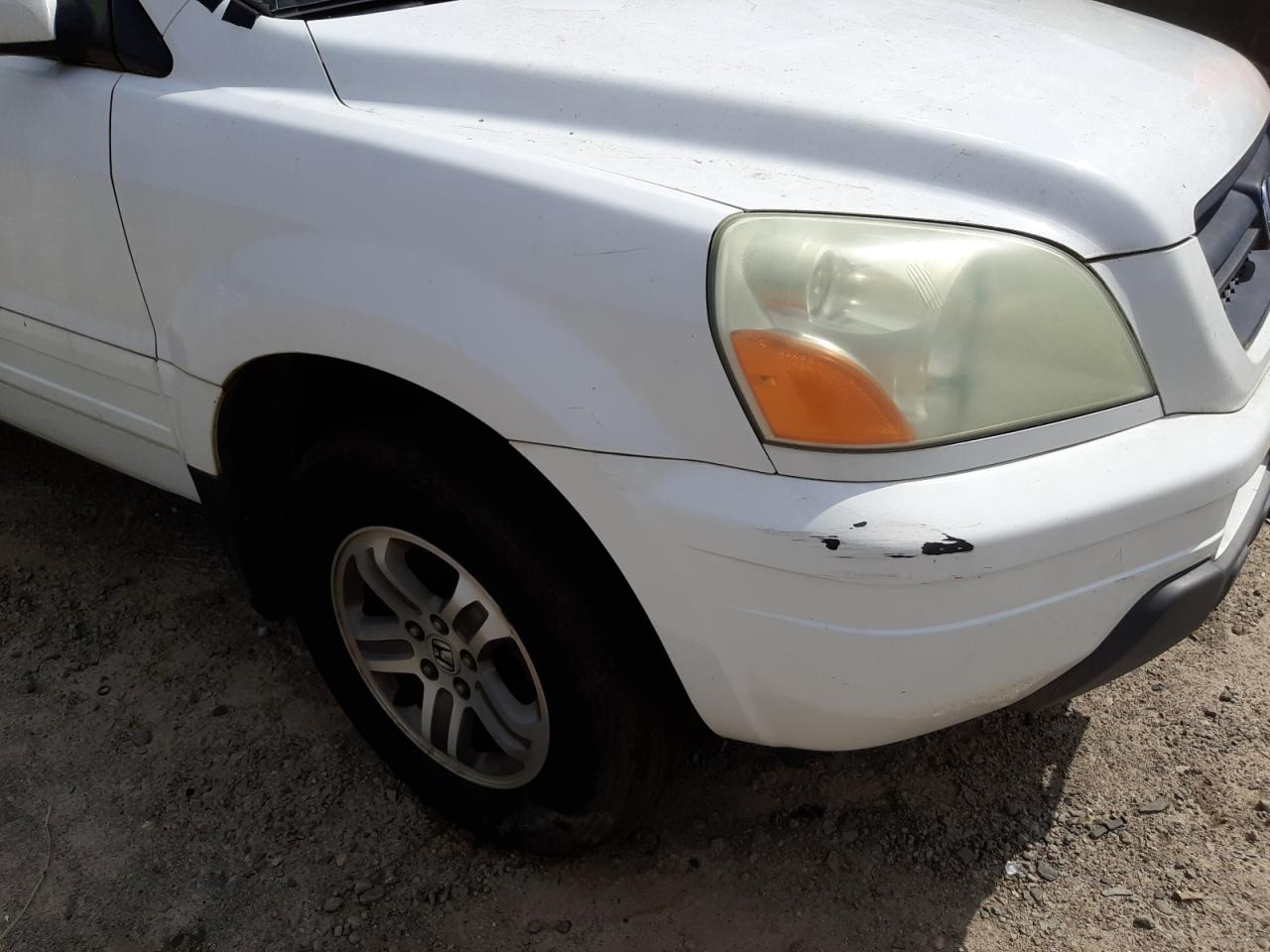 Foto 9 de la subasta – 2004 HONDA PILOT con VIN 2HKYF18654H559391