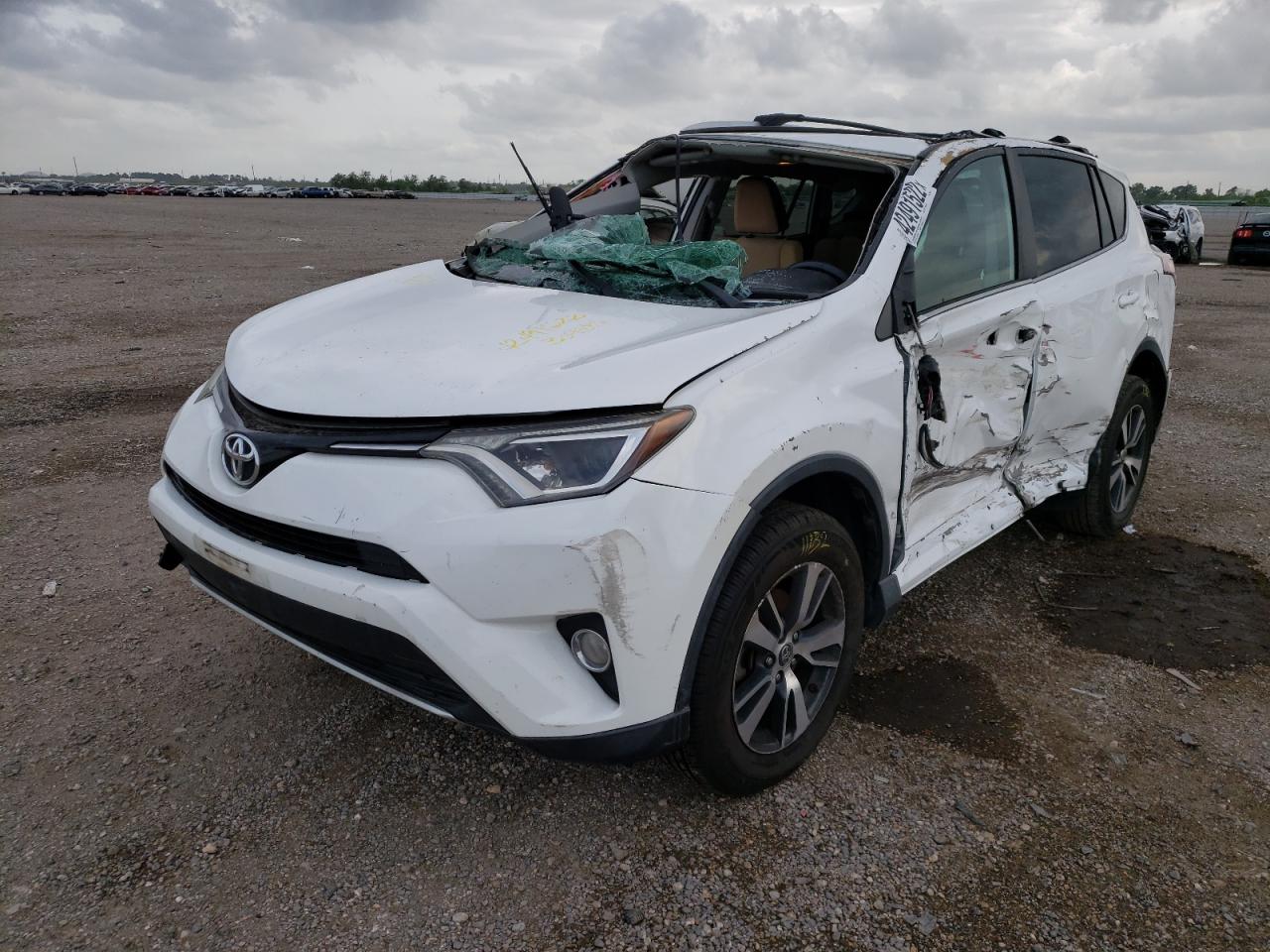 Photo 2 from auction – 2016 TOYOTA RAV4 XLE with VIN 2T3WFREV3GW309386